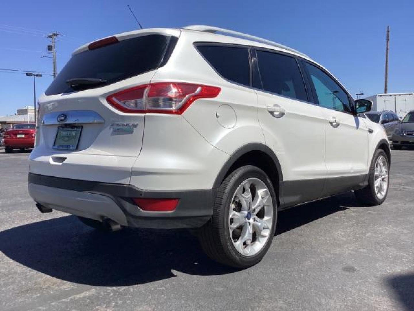 2014 Ingot Silver Metallic Ford Escape Titanium FWD (1FMCU0J95EU) with an 2.0L L4 DOHC 16V engine, 6-Speed Automatic transmission, located at 1235 N Woodruff Ave., Idaho Falls, 83401, (208) 523-1053, 43.507172, -112.000488 - Photo#5