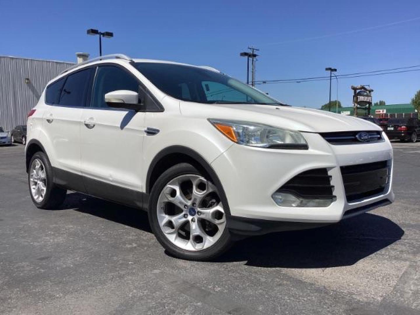 2014 Ingot Silver Metallic Ford Escape Titanium FWD (1FMCU0J95EU) with an 2.0L L4 DOHC 16V engine, 6-Speed Automatic transmission, located at 1235 N Woodruff Ave., Idaho Falls, 83401, (208) 523-1053, 43.507172, -112.000488 - Photo#7