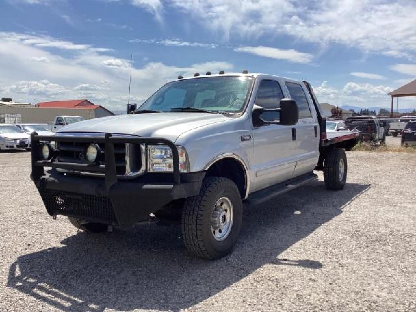 2002 SILVER Ford F-250 SD XLT Crew Cab Long Bed 4WD (1FTNW21F02E) with an 7.3L V8 OHV 16V TURBO DIESEL engine, 4-Speed Automatic transmission, located at 1235 N Woodruff Ave., Idaho Falls, 83401, (208) 523-1053, 43.507172, -112.000488 - Photo#0