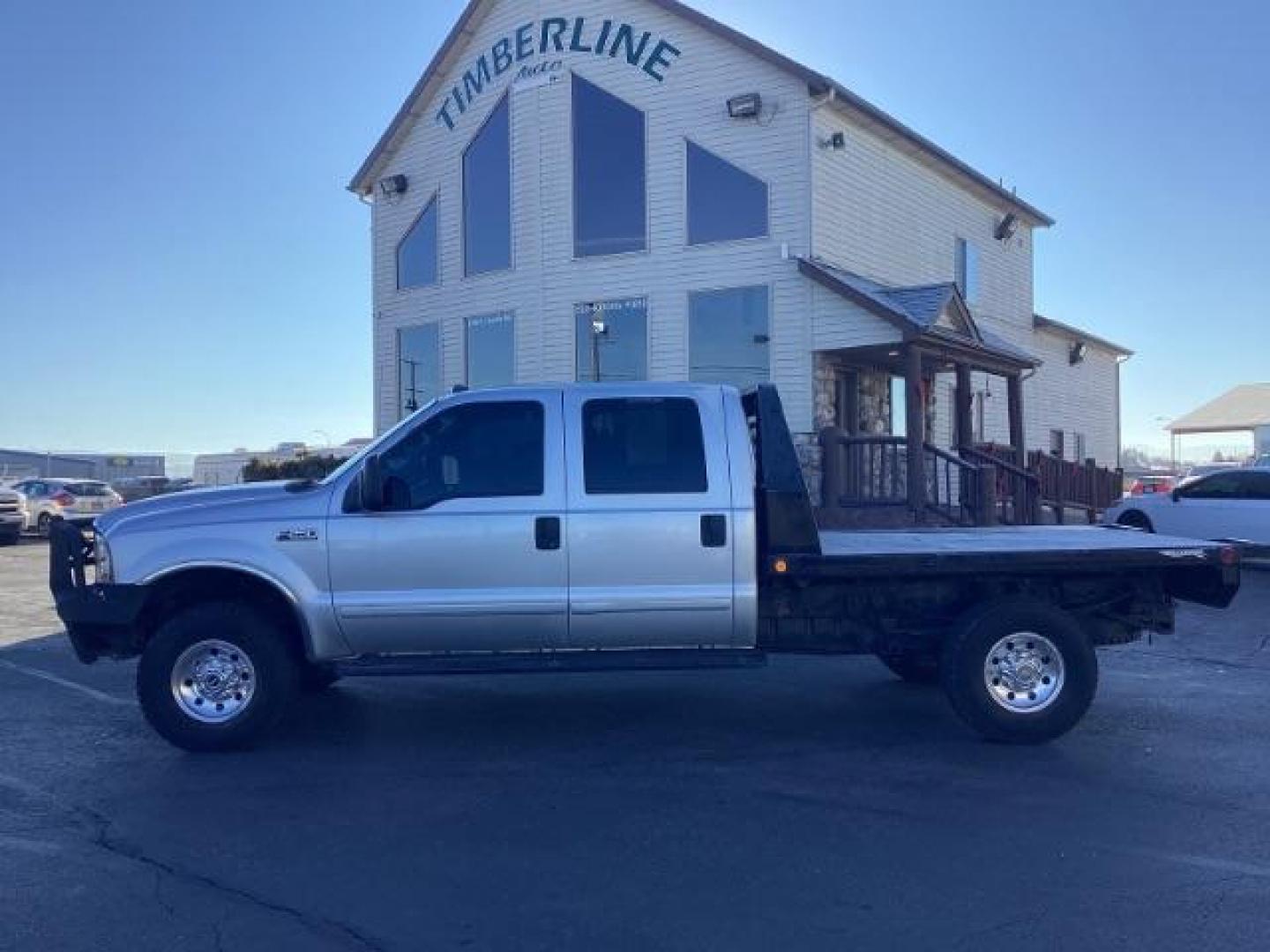 2002 SILVER Ford F-250 SD XLT Crew Cab Long Bed 4WD (1FTNW21F02E) with an 7.3L V8 OHV 16V TURBO DIESEL engine, 4-Speed Automatic transmission, located at 1235 N Woodruff Ave., Idaho Falls, 83401, (208) 523-1053, 43.507172, -112.000488 - Photo#1