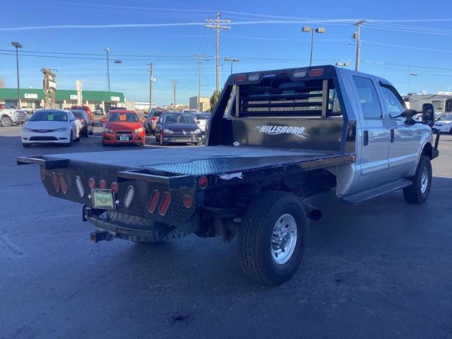 2002 SILVER Ford F-250 SD XLT Crew Cab Long Bed 4WD (1FTNW21F02E) with an 7.3L V8 OHV 16V TURBO DIESEL engine, 4-Speed Automatic transmission, located at 1235 N Woodruff Ave., Idaho Falls, 83401, (208) 523-1053, 43.507172, -112.000488 - Photo#4