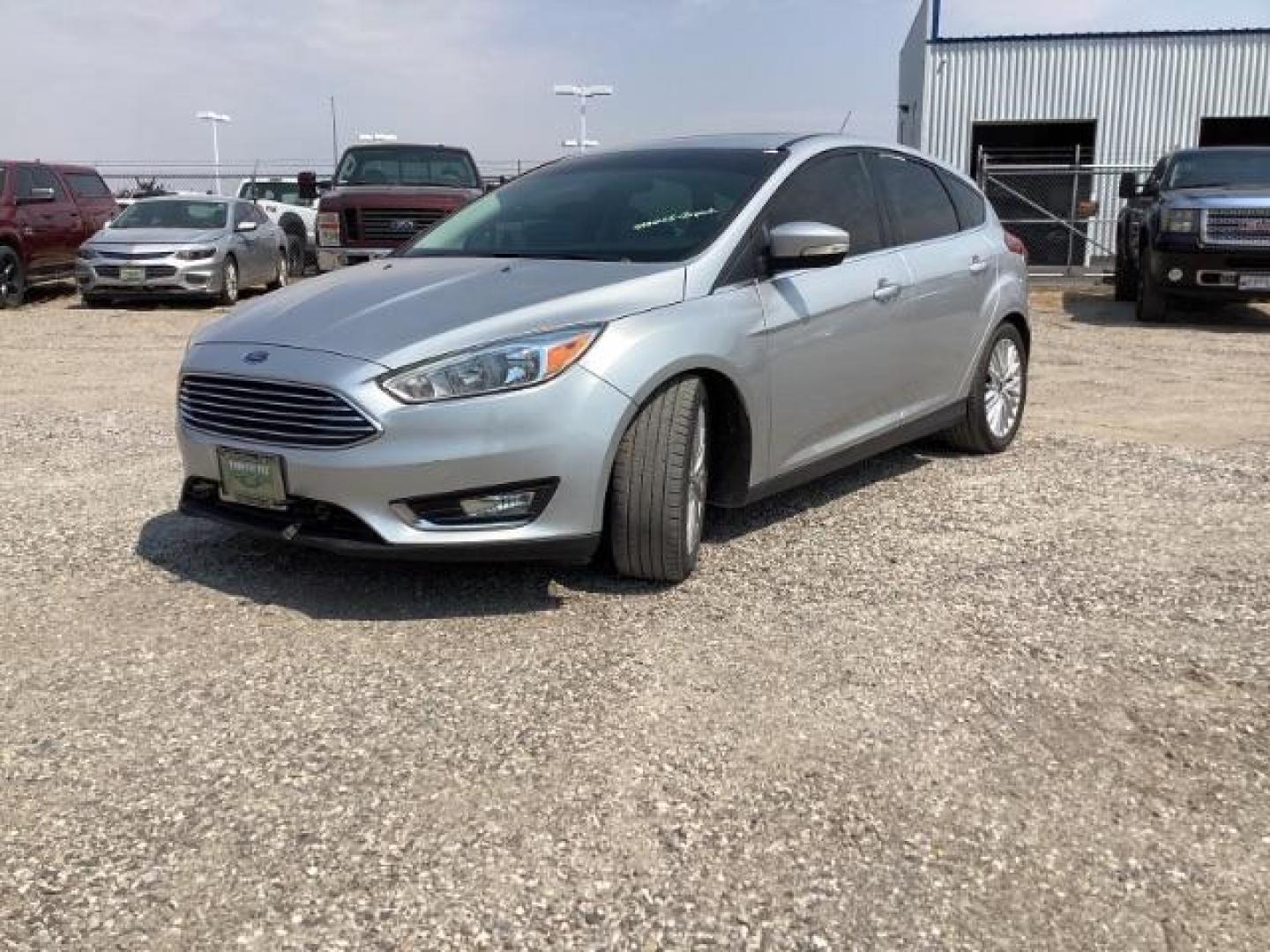 2017 Ford Focus Titanium Hatch (1FADP3N25HL) with an 2.0L L4 DOHC 16V engine, 6-Speed Automatic transmission, located at 1235 N Woodruff Ave., Idaho Falls, 83401, (208) 523-1053, 43.507172, -112.000488 - Photo#0