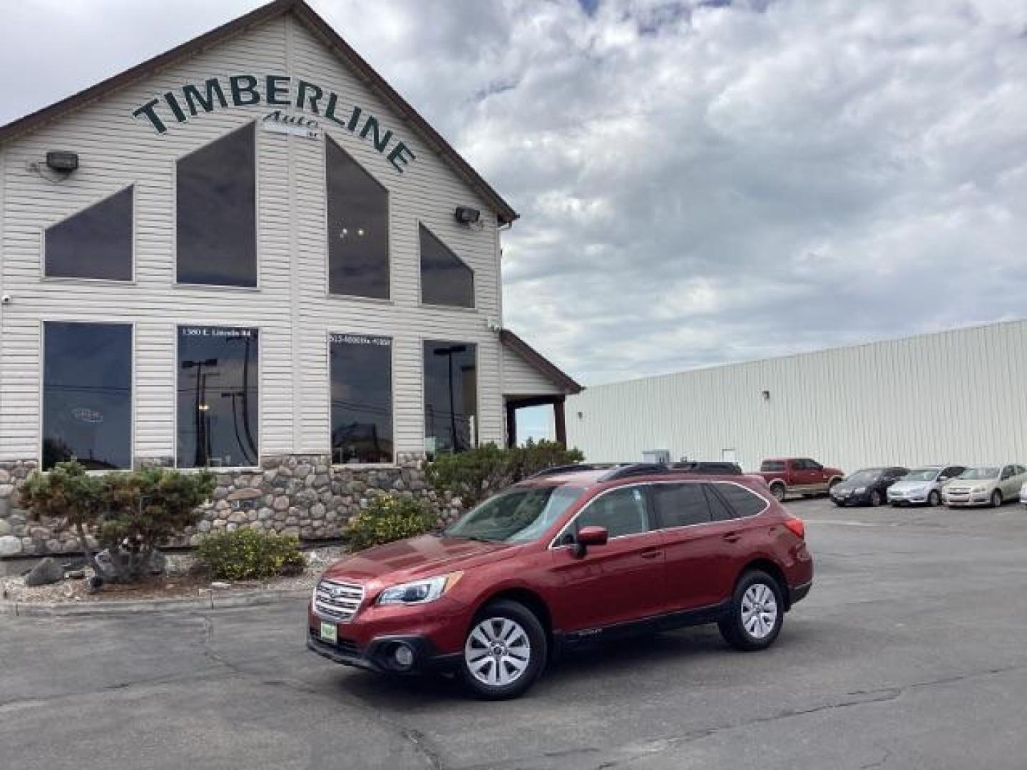 2015 RED /Slate Black Subaru Outback 2.5i Premium (4S4BSACC0F3) with an 2.5L H4 DOHC 16V engine, 6-Speed Automatic transmission, located at 1235 N Woodruff Ave., Idaho Falls, 83401, (208) 523-1053, 43.507172, -112.000488 - Photo#0