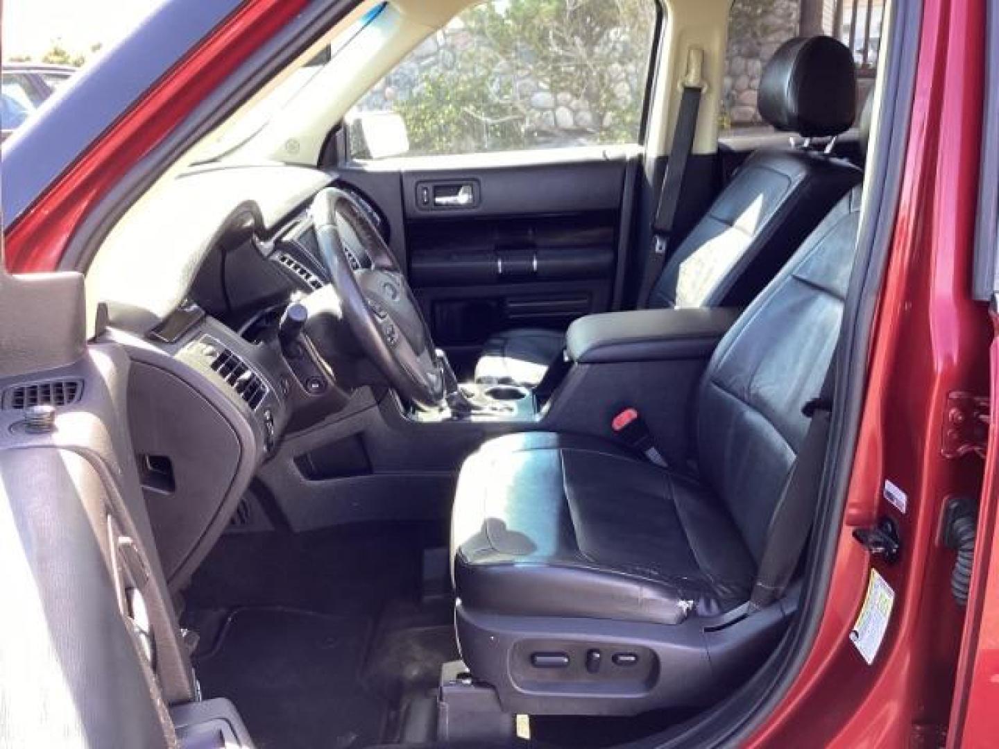 2014 Ruby Red Met Tinted CC Ford Flex SEL AWD (2FMHK6C82EB) with an 3.5L V6 DOHC 24V engine, 6-Speed Automatic Overdrive transmission, located at 1235 N Woodruff Ave., Idaho Falls, 83401, (208) 523-1053, 43.507172, -112.000488 - Photo#16