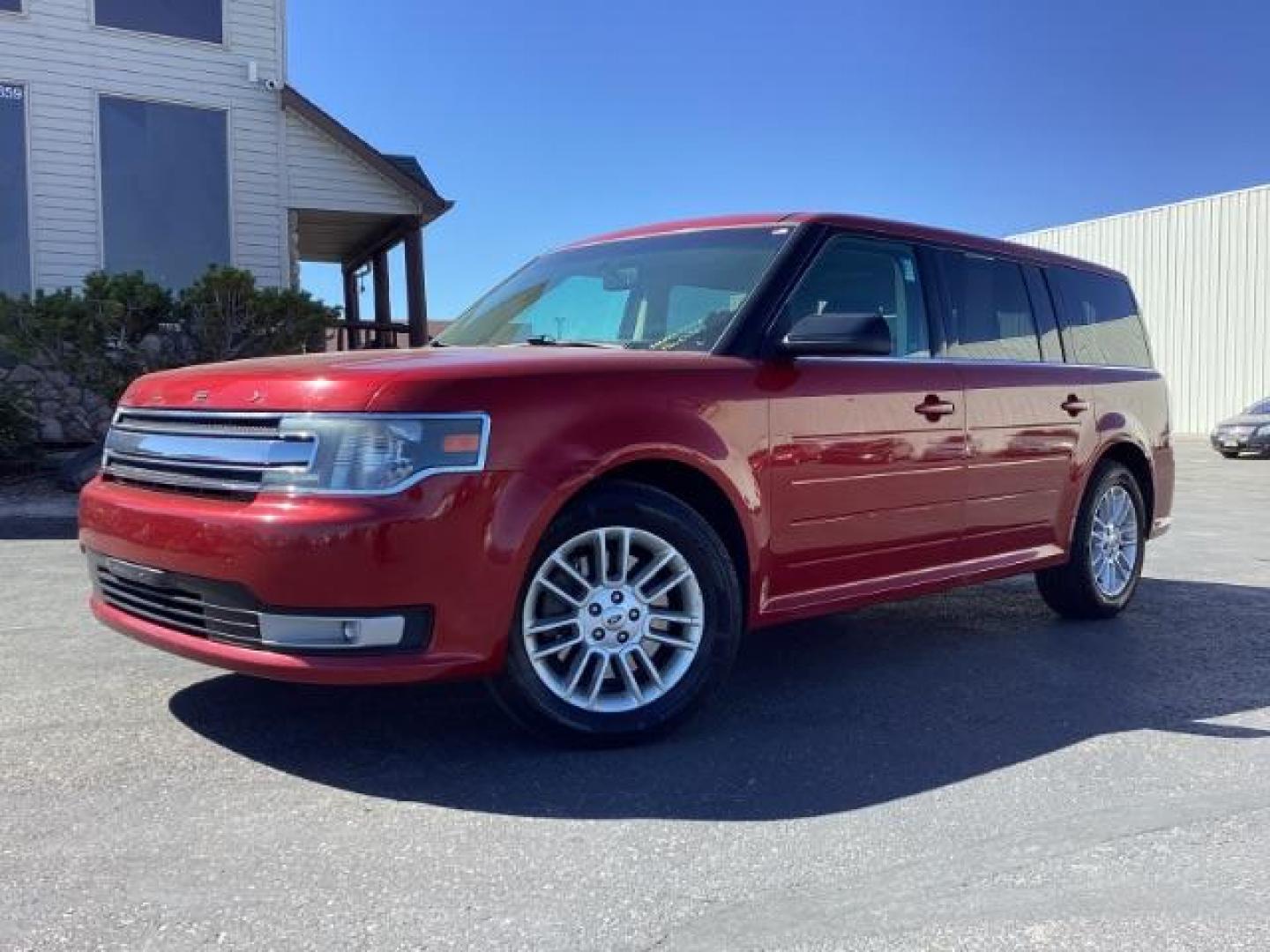 2014 Ruby Red Met Tinted CC Ford Flex SEL AWD (2FMHK6C82EB) with an 3.5L V6 DOHC 24V engine, 6-Speed Automatic Overdrive transmission, located at 1235 N Woodruff Ave., Idaho Falls, 83401, (208) 523-1053, 43.507172, -112.000488 - Photo#1