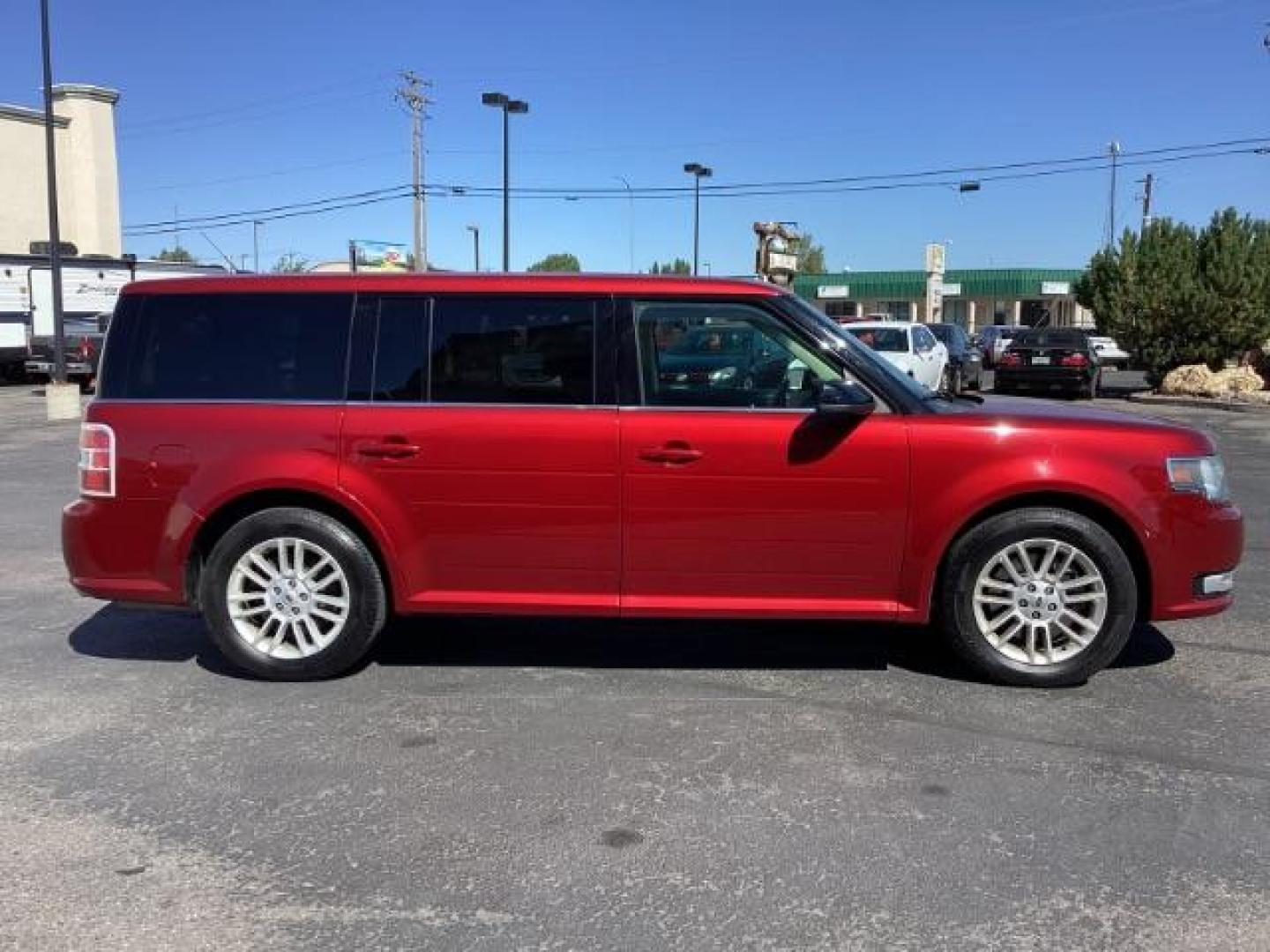 2014 Ruby Red Met Tinted CC Ford Flex SEL AWD (2FMHK6C82EB) with an 3.5L V6 DOHC 24V engine, 6-Speed Automatic Overdrive transmission, located at 1235 N Woodruff Ave., Idaho Falls, 83401, (208) 523-1053, 43.507172, -112.000488 - Photo#6