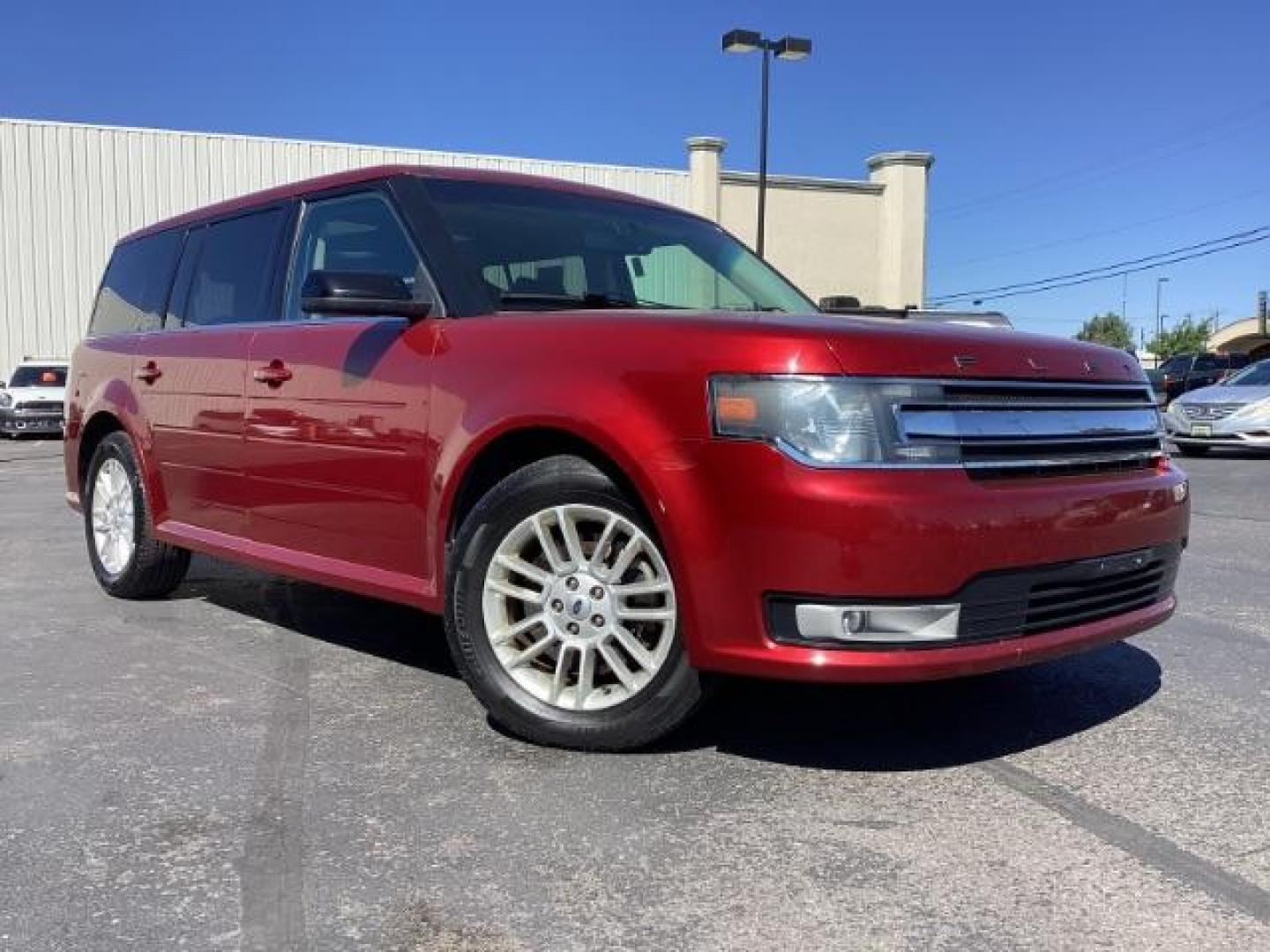 2014 Ruby Red Met Tinted CC Ford Flex SEL AWD (2FMHK6C82EB) with an 3.5L V6 DOHC 24V engine, 6-Speed Automatic Overdrive transmission, located at 1235 N Woodruff Ave., Idaho Falls, 83401, (208) 523-1053, 43.507172, -112.000488 - Photo#7