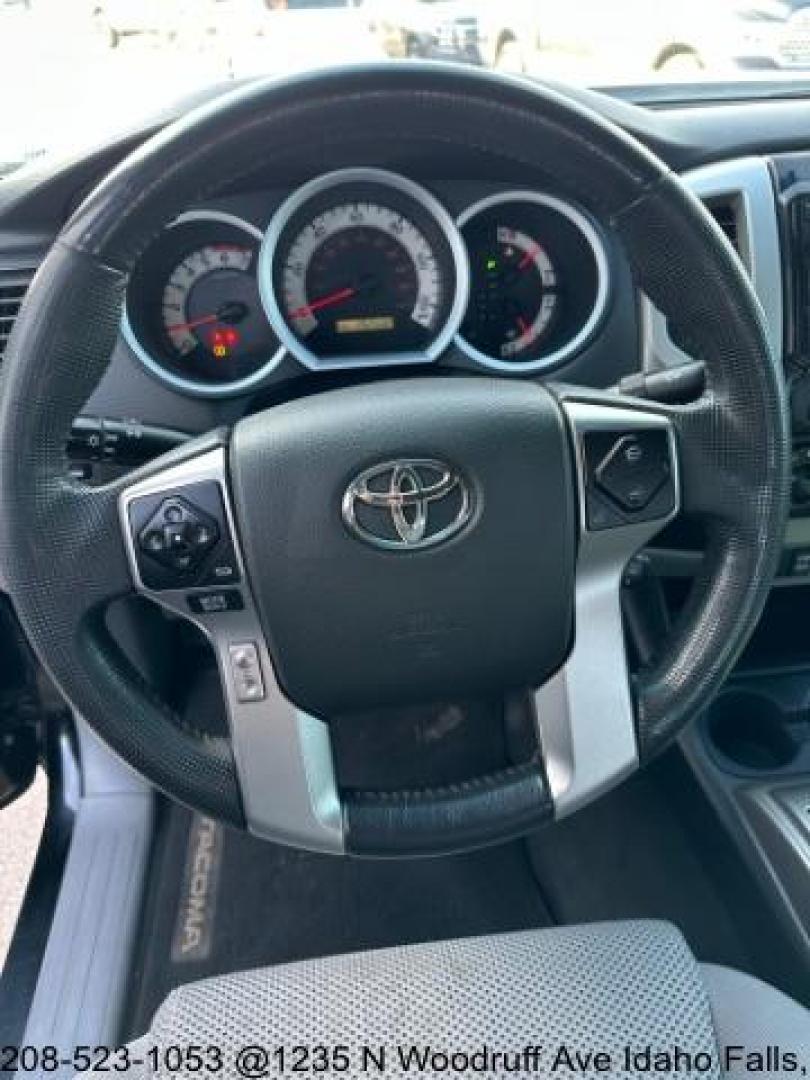 2015 BLACK /CLOTH Toyota Tacoma Access Cab V6 5AT 4WD (5TFUU4EN4FX) with an 4.0L V6 DOHC 24V engine, AUTOMATIC transmission, located at 1235 N Woodruff Ave., Idaho Falls, 83401, (208) 523-1053, 43.507172, -112.000488 - Photo#28