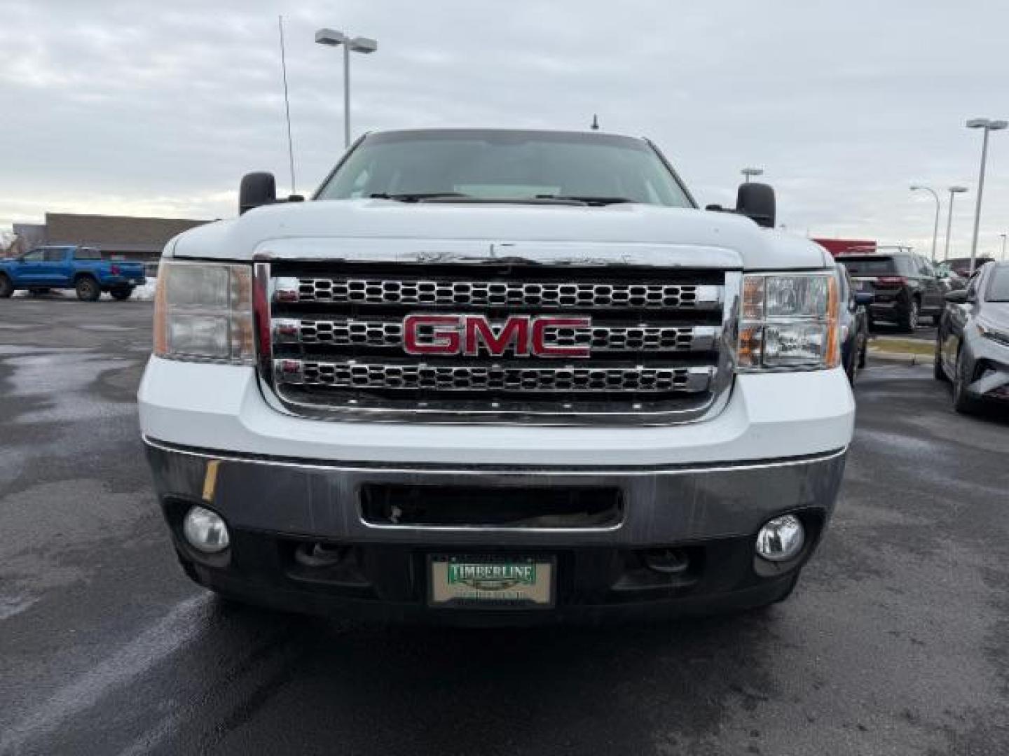 2013 Summit White /Ebony Cloth Interior GMC Sierra 3500HD SLE Crew Cab Long Box 4WD (1GT423C80DF) with an 6.6L V8 32V OHV DIESEL engine, 6-Speed Automatic transmission, located at 1235 N Woodruff Ave., Idaho Falls, 83401, (208) 523-1053, 43.507172, -112.000488 - Photo#7