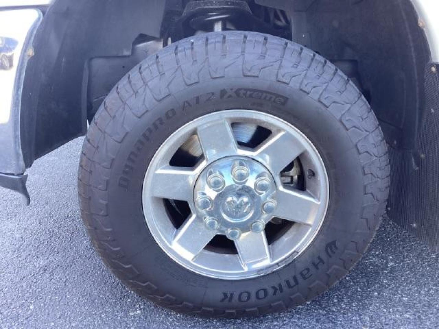 2010 Bright Silver Metallic /Dark Slate/Medium Slate Gray Cloth Interior RAM 3500 SLT Mega Cab 4WD (3D73Y3HL5AG) with an 6.7L L6 OHV 24V TURBO DIESEL engine, 4-Speed Automatic transmission, located at 1235 N Woodruff Ave., Idaho Falls, 83401, (208) 523-1053, 43.507172, -112.000488 - Photo#10