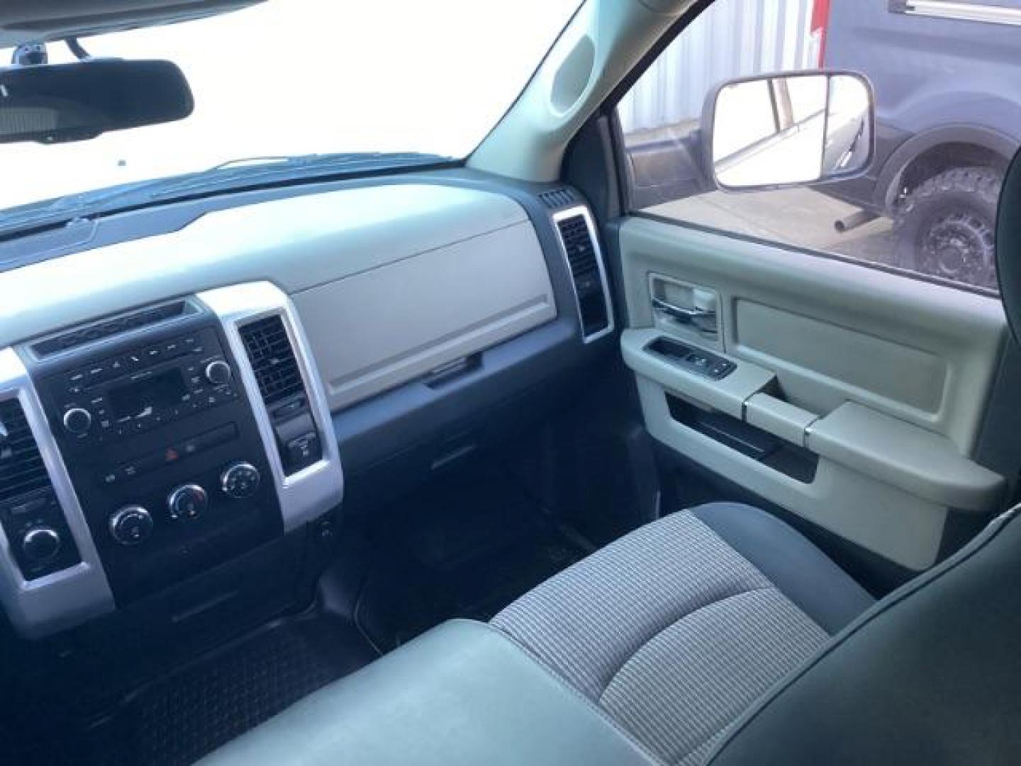 2010 Bright Silver Metallic /Dark Slate/Medium Slate Gray Cloth Interior RAM 3500 SLT Mega Cab 4WD (3D73Y3HL5AG) with an 6.7L L6 OHV 24V TURBO DIESEL engine, 4-Speed Automatic transmission, located at 1235 N Woodruff Ave., Idaho Falls, 83401, (208) 523-1053, 43.507172, -112.000488 - Photo#16