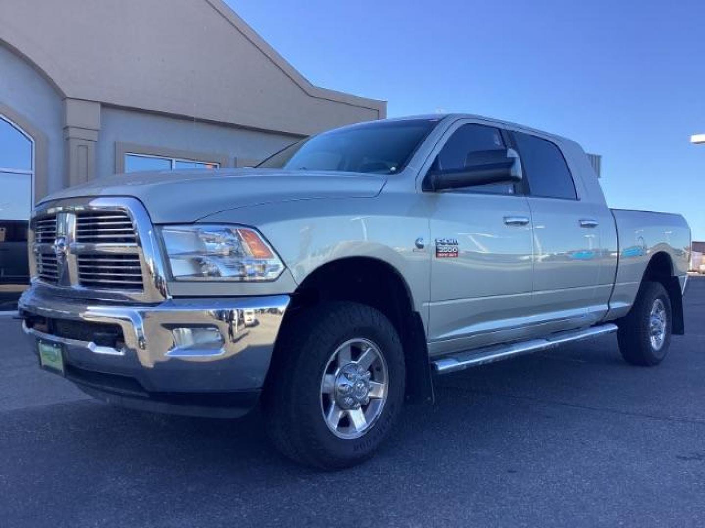 2010 Bright Silver Metallic /Dark Slate/Medium Slate Gray Cloth Interior RAM 3500 SLT Mega Cab 4WD (3D73Y3HL5AG) with an 6.7L L6 OHV 24V TURBO DIESEL engine, 4-Speed Automatic transmission, located at 1235 N Woodruff Ave., Idaho Falls, 83401, (208) 523-1053, 43.507172, -112.000488 - Photo#1