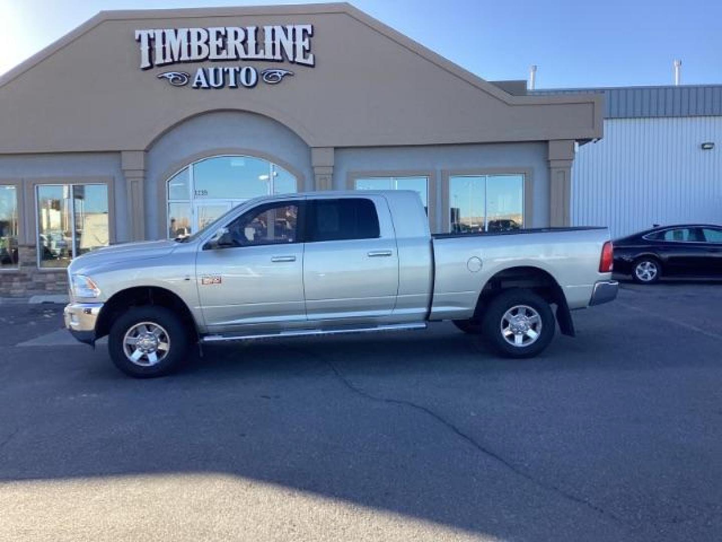 2010 Bright Silver Metallic /Dark Slate/Medium Slate Gray Cloth Interior RAM 3500 SLT Mega Cab 4WD (3D73Y3HL5AG) with an 6.7L L6 OHV 24V TURBO DIESEL engine, 4-Speed Automatic transmission, located at 1235 N Woodruff Ave., Idaho Falls, 83401, (208) 523-1053, 43.507172, -112.000488 - Photo#2