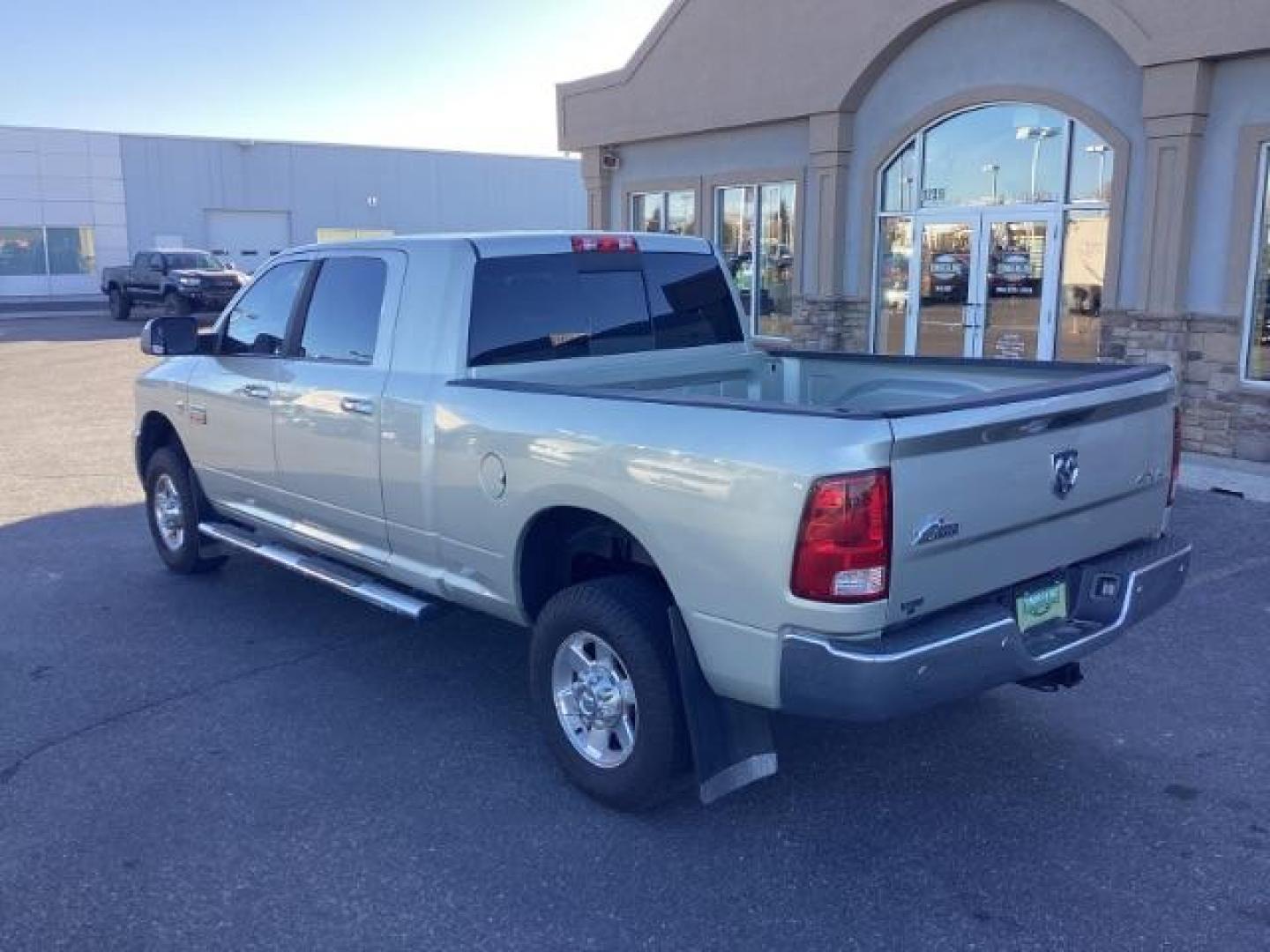 2010 Bright Silver Metallic /Dark Slate/Medium Slate Gray Cloth Interior RAM 3500 SLT Mega Cab 4WD (3D73Y3HL5AG) with an 6.7L L6 OHV 24V TURBO DIESEL engine, 4-Speed Automatic transmission, located at 1235 N Woodruff Ave., Idaho Falls, 83401, (208) 523-1053, 43.507172, -112.000488 - Photo#3