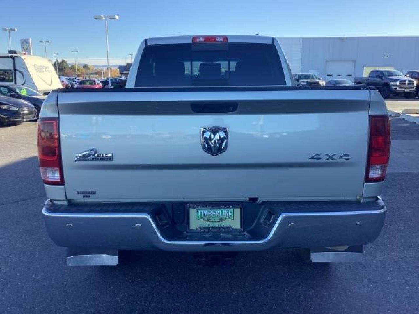 2010 Bright Silver Metallic /Dark Slate/Medium Slate Gray Cloth Interior RAM 3500 SLT Mega Cab 4WD (3D73Y3HL5AG) with an 6.7L L6 OHV 24V TURBO DIESEL engine, 4-Speed Automatic transmission, located at 1235 N Woodruff Ave., Idaho Falls, 83401, (208) 523-1053, 43.507172, -112.000488 - Photo#4