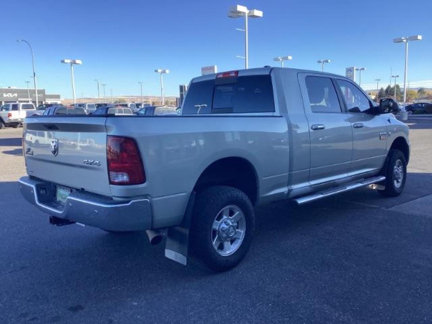 2010 Bright Silver Metallic /Dark Slate/Medium Slate Gray Cloth Interior RAM 3500 SLT Mega Cab 4WD (3D73Y3HL5AG) with an 6.7L L6 OHV 24V TURBO DIESEL engine, 4-Speed Automatic transmission, located at 1235 N Woodruff Ave., Idaho Falls, 83401, (208) 523-1053, 43.507172, -112.000488 - Photo#5