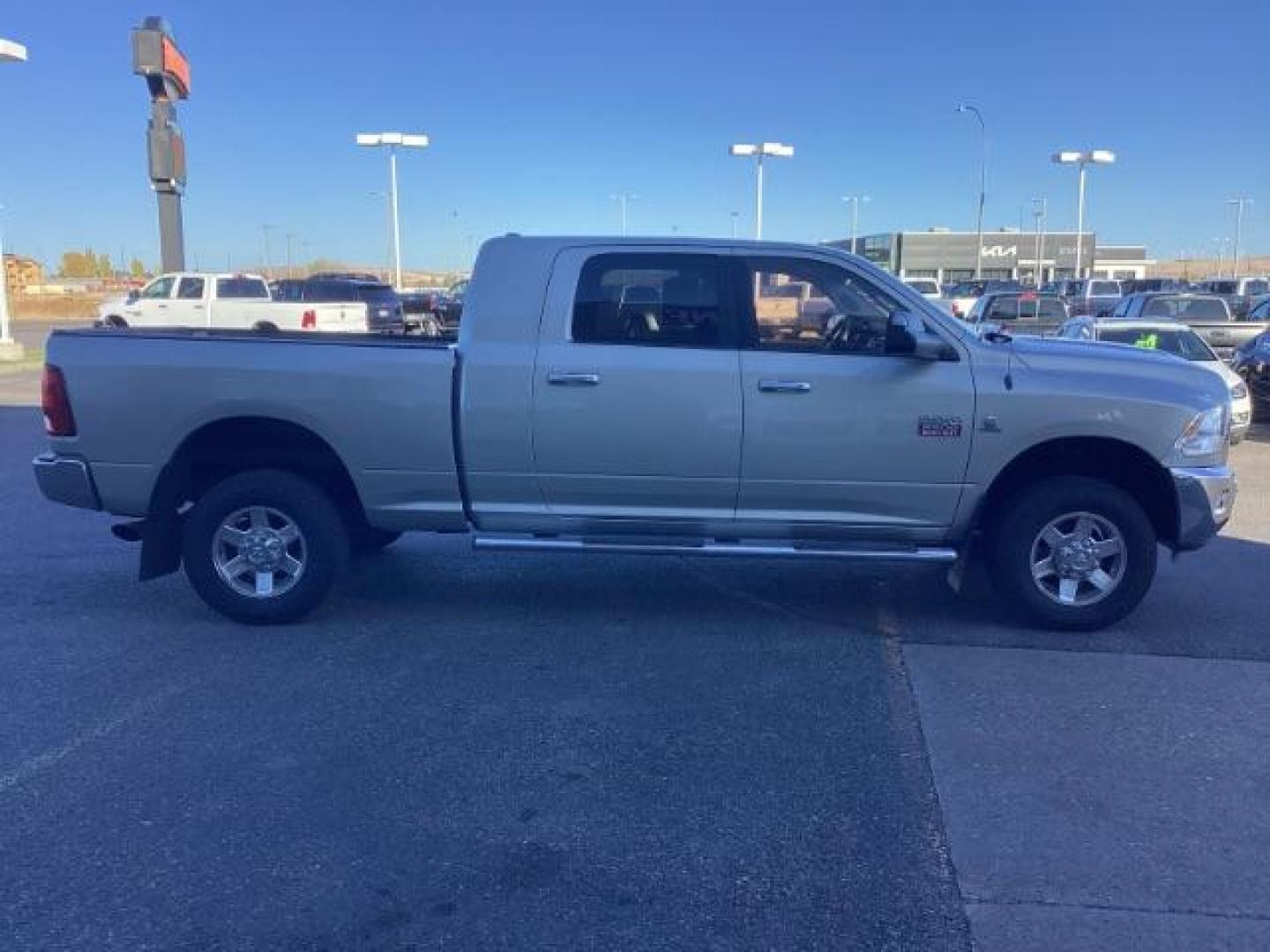 2010 Bright Silver Metallic /Dark Slate/Medium Slate Gray Cloth Interior RAM 3500 SLT Mega Cab 4WD (3D73Y3HL5AG) with an 6.7L L6 OHV 24V TURBO DIESEL engine, 4-Speed Automatic transmission, located at 1235 N Woodruff Ave., Idaho Falls, 83401, (208) 523-1053, 43.507172, -112.000488 - Photo#6