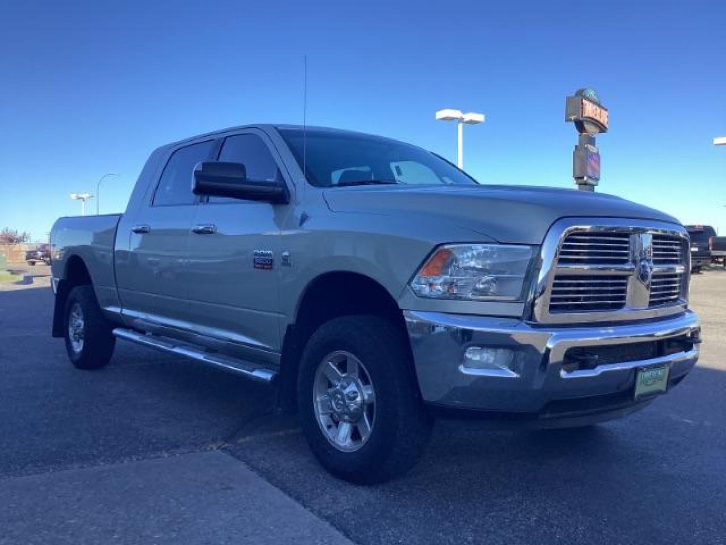 2010 Bright Silver Metallic /Dark Slate/Medium Slate Gray Cloth Interior RAM 3500 SLT Mega Cab 4WD (3D73Y3HL5AG) with an 6.7L L6 OHV 24V TURBO DIESEL engine, 4-Speed Automatic transmission, located at 1235 N Woodruff Ave., Idaho Falls, 83401, (208) 523-1053, 43.507172, -112.000488 - Photo#7