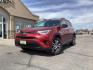 2018 Ruby Flare Pearl /Black, cloth Toyota RAV4 LE AWD (2T3BFREVXJW) with an 2.5L L4 DOHC 16V engine, 6-Speed Automatic transmission, located at 1235 N Woodruff Ave., Idaho Falls, 83401, (208) 523-1053, 43.507172, -112.000488 - Photo#1