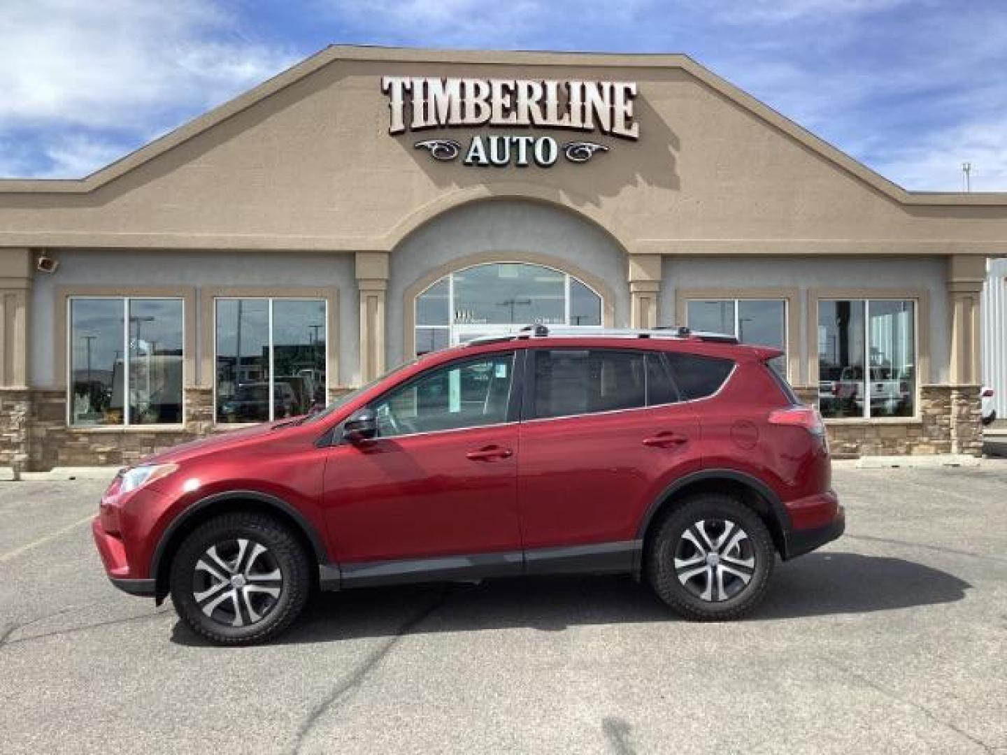 2018 Ruby Flare Pearl /Black, cloth Toyota RAV4 LE AWD (2T3BFREVXJW) with an 2.5L L4 DOHC 16V engine, 6-Speed Automatic transmission, located at 1235 N Woodruff Ave., Idaho Falls, 83401, (208) 523-1053, 43.507172, -112.000488 - Photo#2