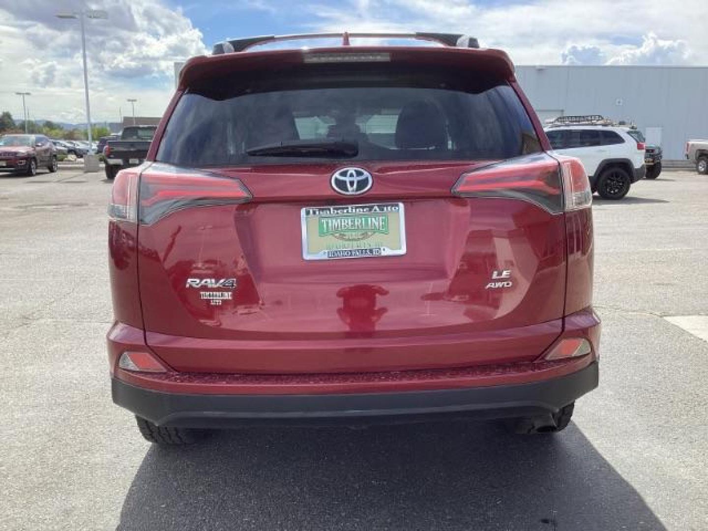 2018 Ruby Flare Pearl /Black, cloth Toyota RAV4 LE AWD (2T3BFREVXJW) with an 2.5L L4 DOHC 16V engine, 6-Speed Automatic transmission, located at 1235 N Woodruff Ave., Idaho Falls, 83401, (208) 523-1053, 43.507172, -112.000488 - Photo#4