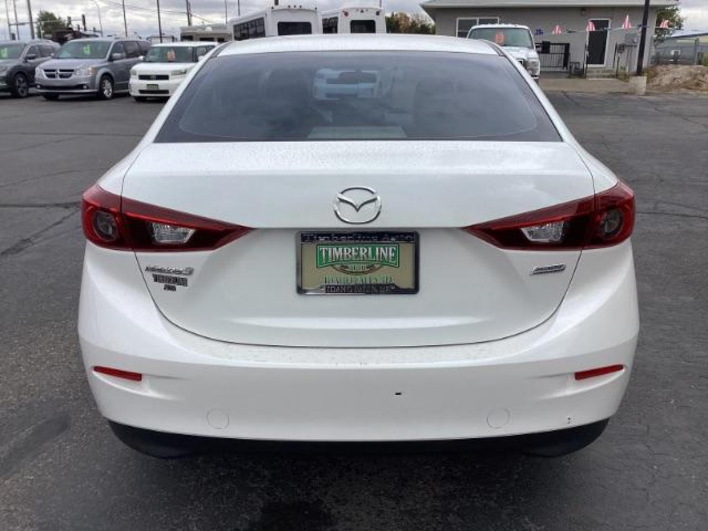 2014 WHITE /Black Mazda MAZDA3 i Sport AT 4-Door (JM1BM1U74E1) with an 2.0L L4 DOHC 16V engine, 6-Speed Automatic transmission, located at 1235 N Woodruff Ave., Idaho Falls, 83401, (208) 523-1053, 43.507172, -112.000488 - Photo#4