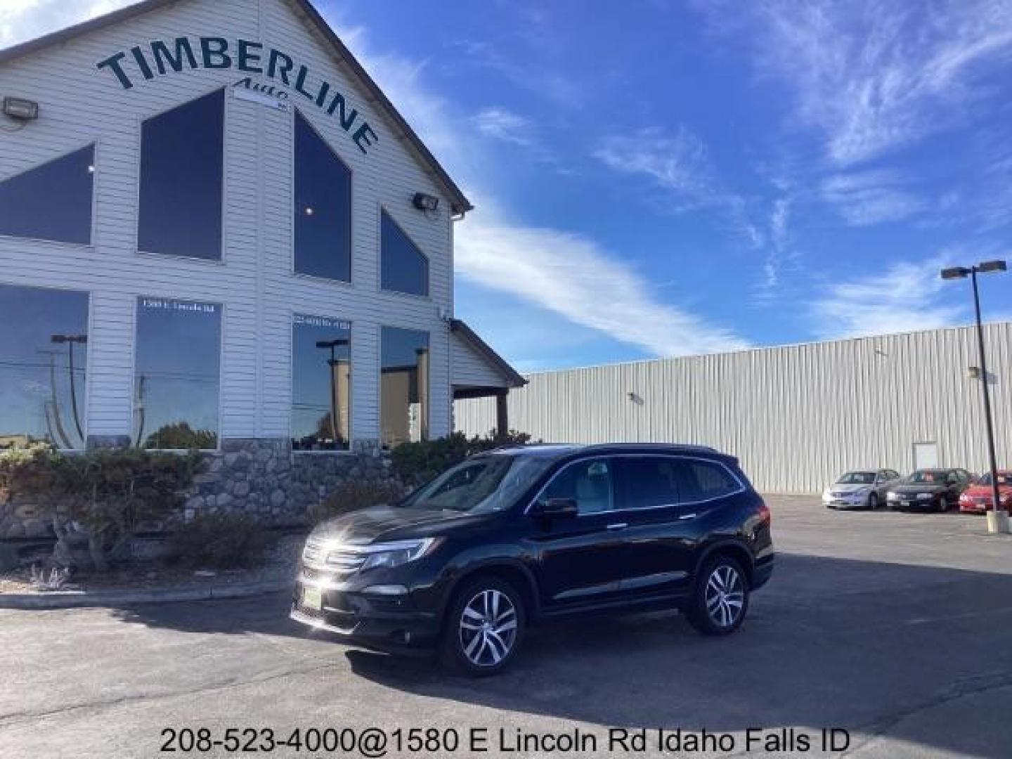 2017 Black Forest Pearl /Black, leather Honda Pilot Elite 4WD (5FNYF6H06HB) with an 3.5L V6 SOHC 24V engine, 9-Speed Automatic transmission, located at 1235 N Woodruff Ave., Idaho Falls, 83401, (208) 523-1053, 43.507172, -112.000488 - Photo#0