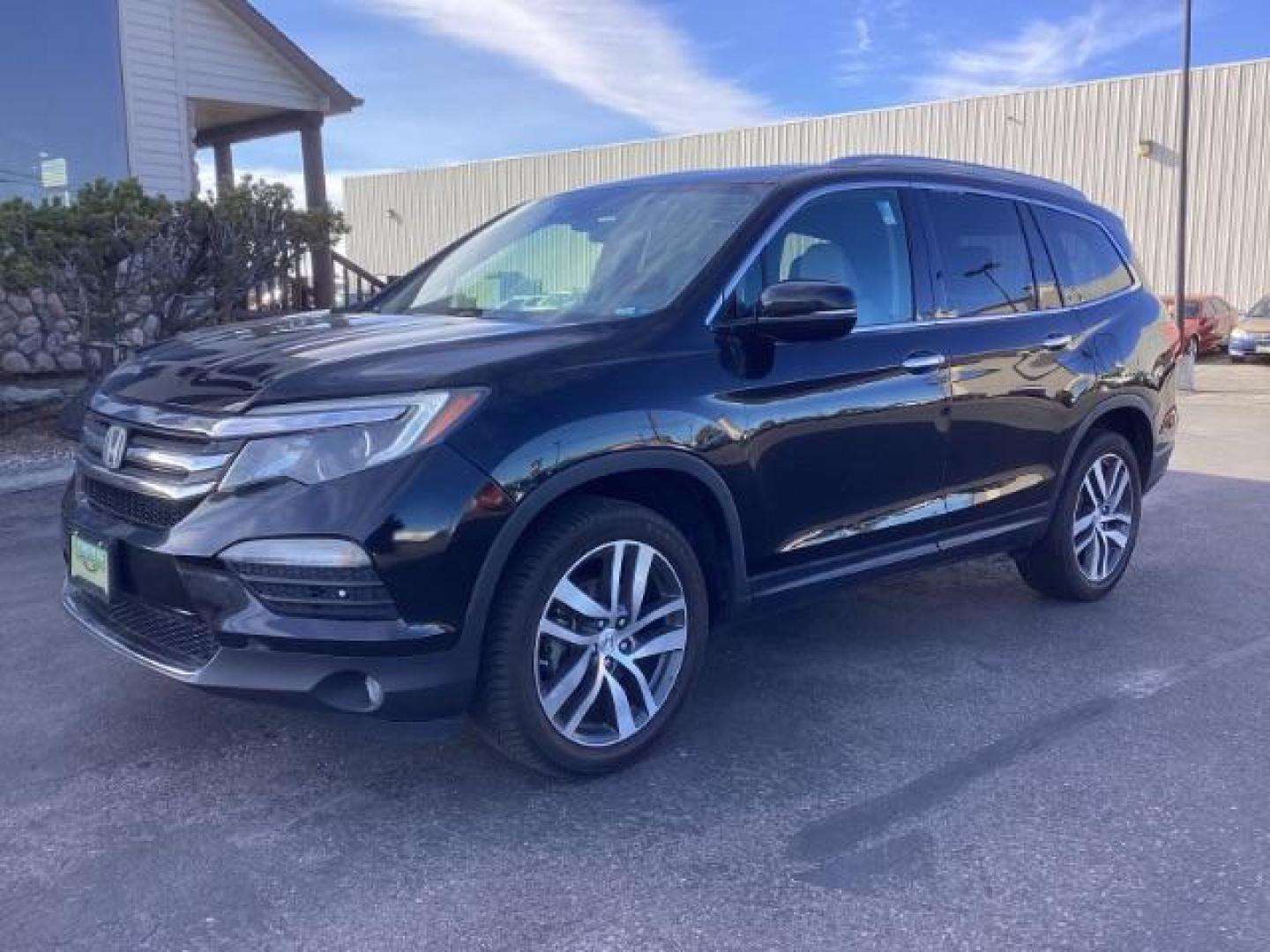 2017 Black Forest Pearl /Black, leather Honda Pilot Elite 4WD (5FNYF6H06HB) with an 3.5L V6 SOHC 24V engine, 9-Speed Automatic transmission, located at 1235 N Woodruff Ave., Idaho Falls, 83401, (208) 523-1053, 43.507172, -112.000488 - Photo#1