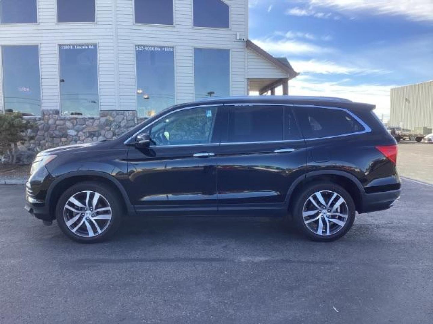 2017 Black Forest Pearl /Black, leather Honda Pilot Elite 4WD (5FNYF6H06HB) with an 3.5L V6 SOHC 24V engine, 9-Speed Automatic transmission, located at 1235 N Woodruff Ave., Idaho Falls, 83401, (208) 523-1053, 43.507172, -112.000488 - Photo#2