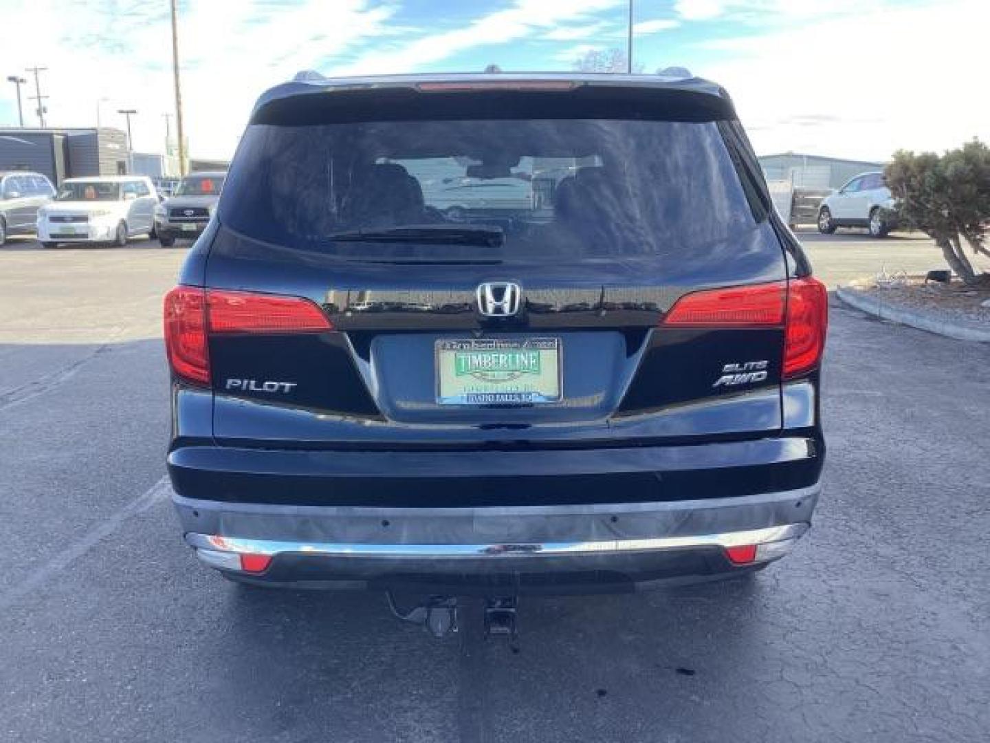 2017 Black Forest Pearl /Black, leather Honda Pilot Elite 4WD (5FNYF6H06HB) with an 3.5L V6 SOHC 24V engine, 9-Speed Automatic transmission, located at 1235 N Woodruff Ave., Idaho Falls, 83401, (208) 523-1053, 43.507172, -112.000488 - Photo#4