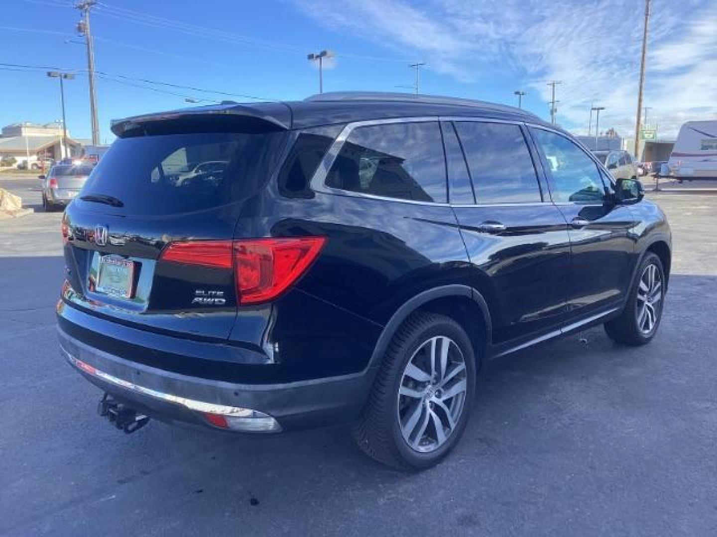 2017 Black Forest Pearl /Black, leather Honda Pilot Elite 4WD (5FNYF6H06HB) with an 3.5L V6 SOHC 24V engine, 9-Speed Automatic transmission, located at 1235 N Woodruff Ave., Idaho Falls, 83401, (208) 523-1053, 43.507172, -112.000488 - Photo#5