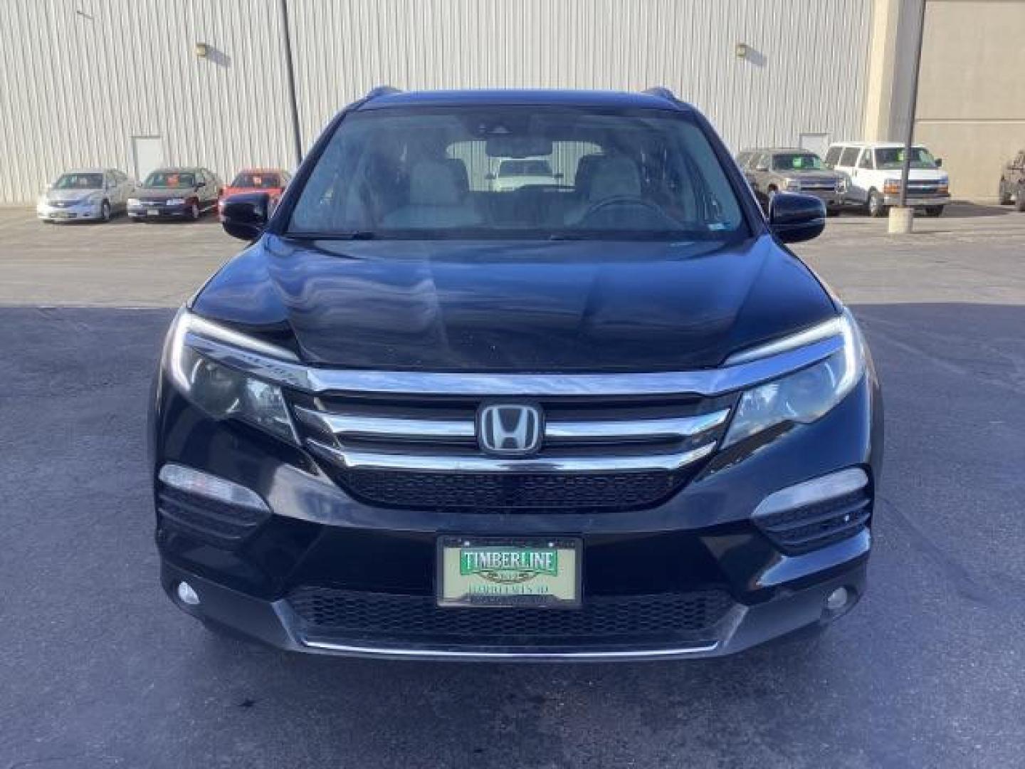 2017 Black Forest Pearl /Black, leather Honda Pilot Elite 4WD (5FNYF6H06HB) with an 3.5L V6 SOHC 24V engine, 9-Speed Automatic transmission, located at 1235 N Woodruff Ave., Idaho Falls, 83401, (208) 523-1053, 43.507172, -112.000488 - Photo#6