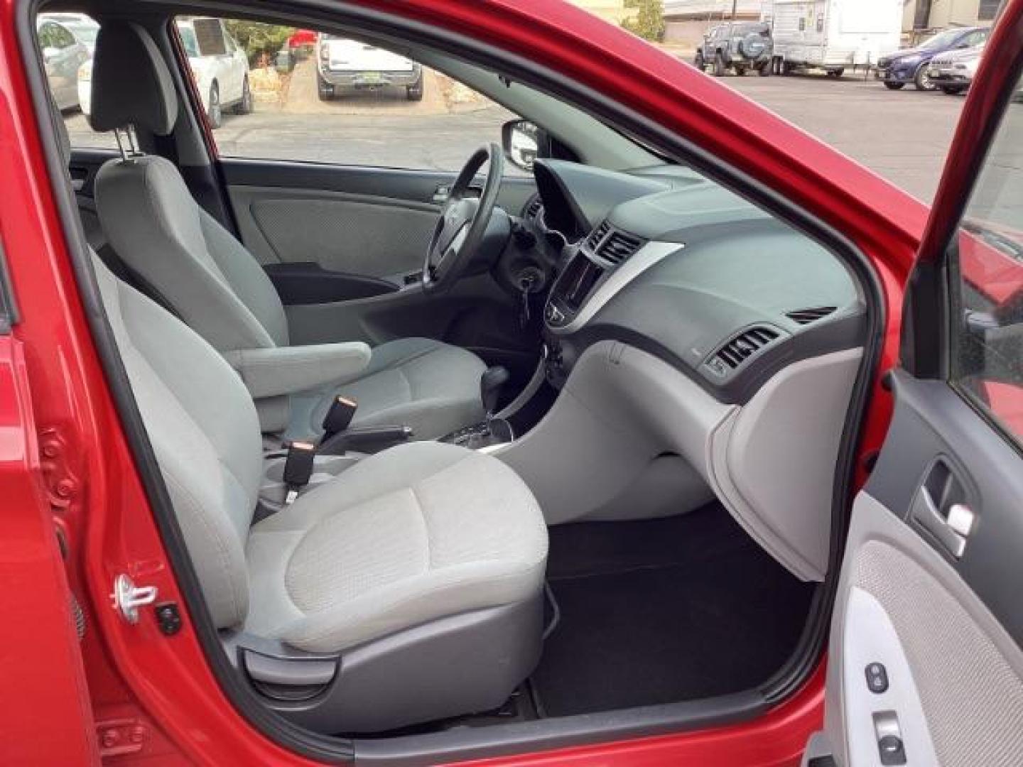 2014 Boston Red Pearl Hyundai Accent GLS 4-Door (KMHCT4AE5EU) with an 1.6L L4 DOHC 16V engine, located at 1235 N Woodruff Ave., Idaho Falls, 83401, (208) 523-1053, 43.507172, -112.000488 - Photo#17