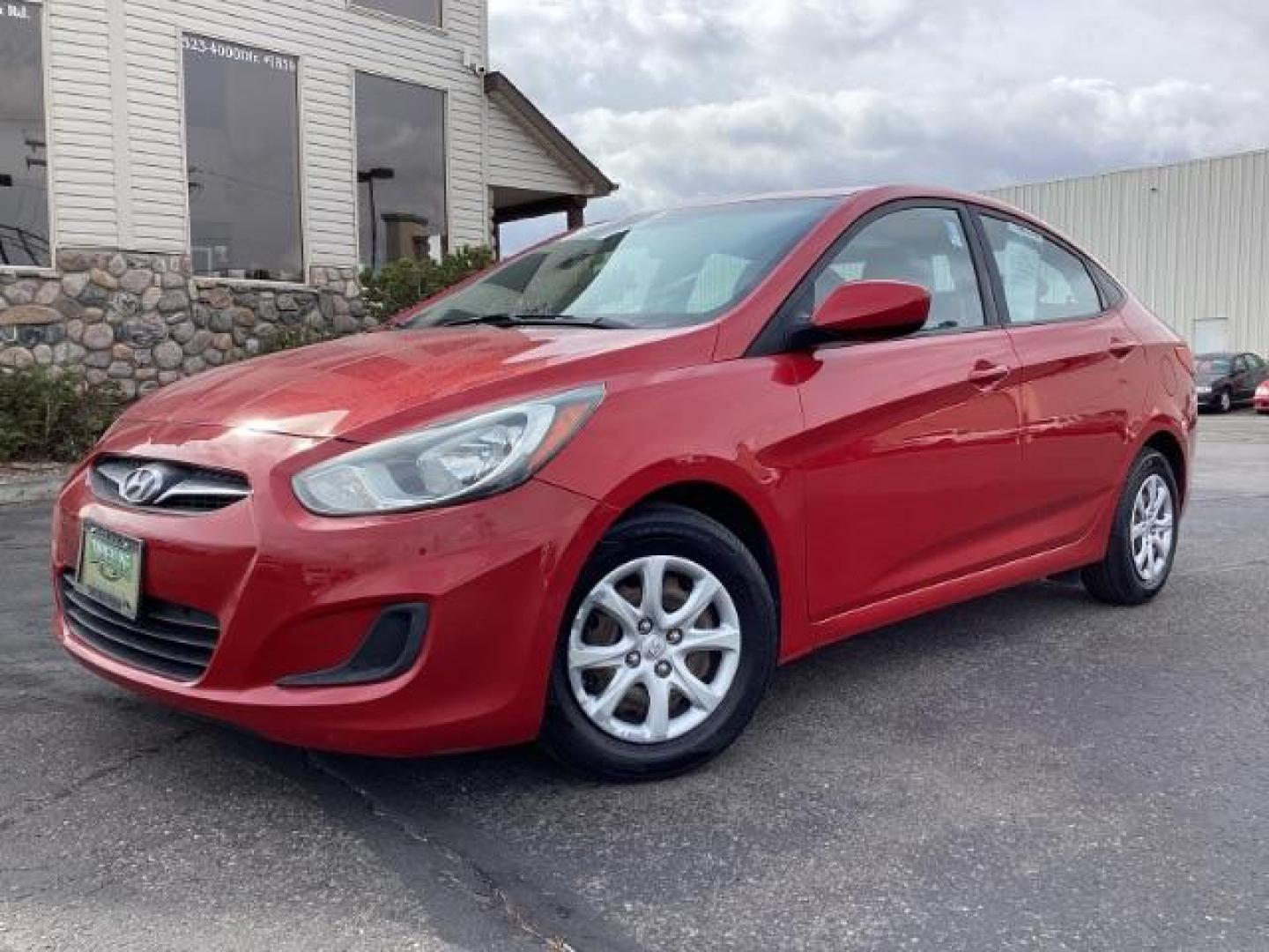 2014 Boston Red Pearl Hyundai Accent GLS 4-Door (KMHCT4AE5EU) with an 1.6L L4 DOHC 16V engine, located at 1235 N Woodruff Ave., Idaho Falls, 83401, (208) 523-1053, 43.507172, -112.000488 - Photo#1