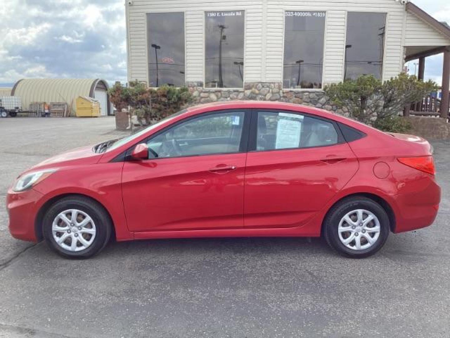 2014 Boston Red Pearl Hyundai Accent GLS 4-Door (KMHCT4AE5EU) with an 1.6L L4 DOHC 16V engine, located at 1235 N Woodruff Ave., Idaho Falls, 83401, (208) 523-1053, 43.507172, -112.000488 - Photo#2