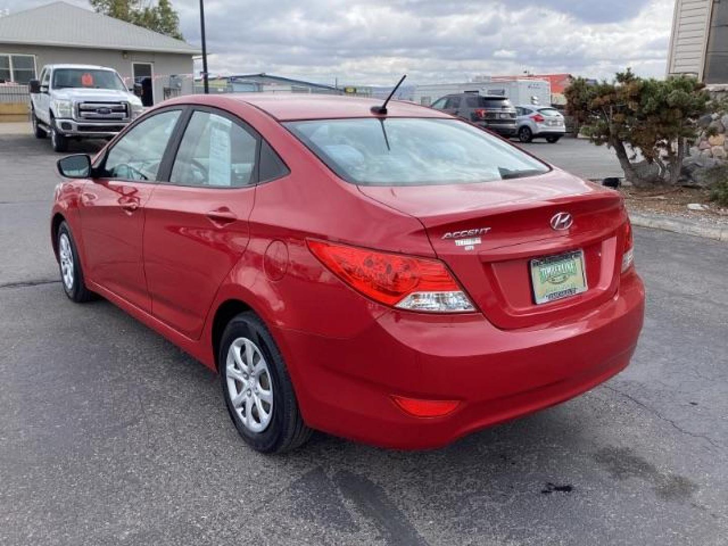 2014 Boston Red Pearl Hyundai Accent GLS 4-Door (KMHCT4AE5EU) with an 1.6L L4 DOHC 16V engine, located at 1235 N Woodruff Ave., Idaho Falls, 83401, (208) 523-1053, 43.507172, -112.000488 - Photo#3