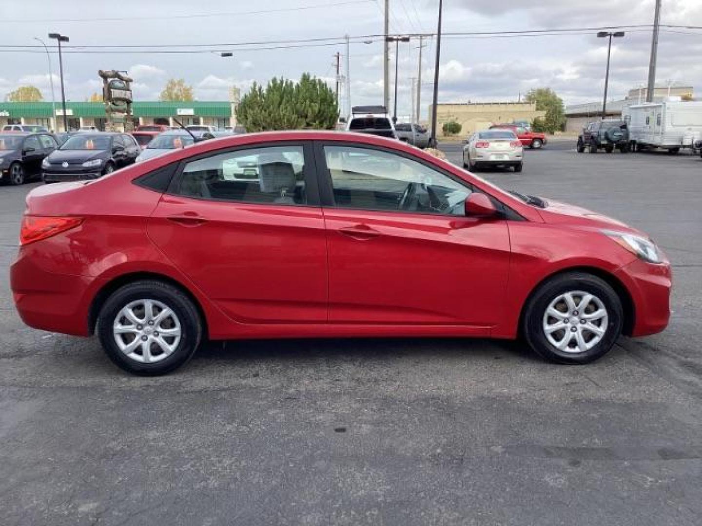 2014 Boston Red Pearl Hyundai Accent GLS 4-Door (KMHCT4AE5EU) with an 1.6L L4 DOHC 16V engine, located at 1235 N Woodruff Ave., Idaho Falls, 83401, (208) 523-1053, 43.507172, -112.000488 - Photo#5