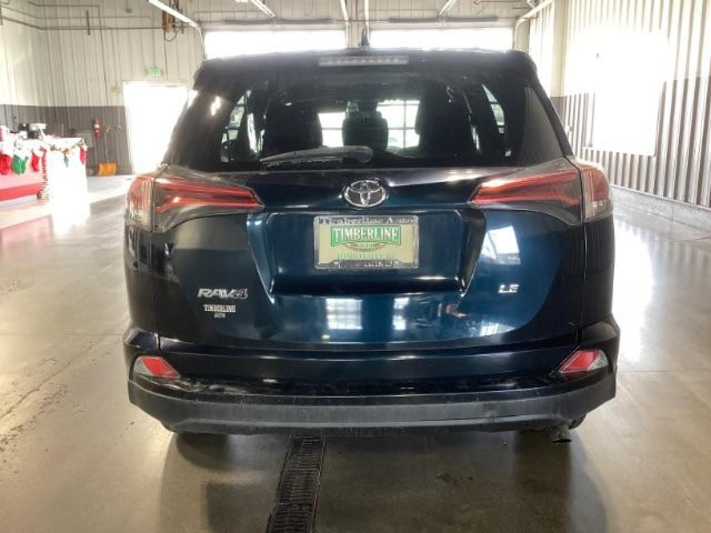 2018 Galactic Aqua Mica /Black, cloth Toyota RAV4 LE FWD (2T3ZFREV9JW) with an 2.5L L4 DOHC 16V engine, 6-Speed Automatic transmission, located at 1235 N Woodruff Ave., Idaho Falls, 83401, (208) 523-1053, 43.507172, -112.000488 - Photo#2