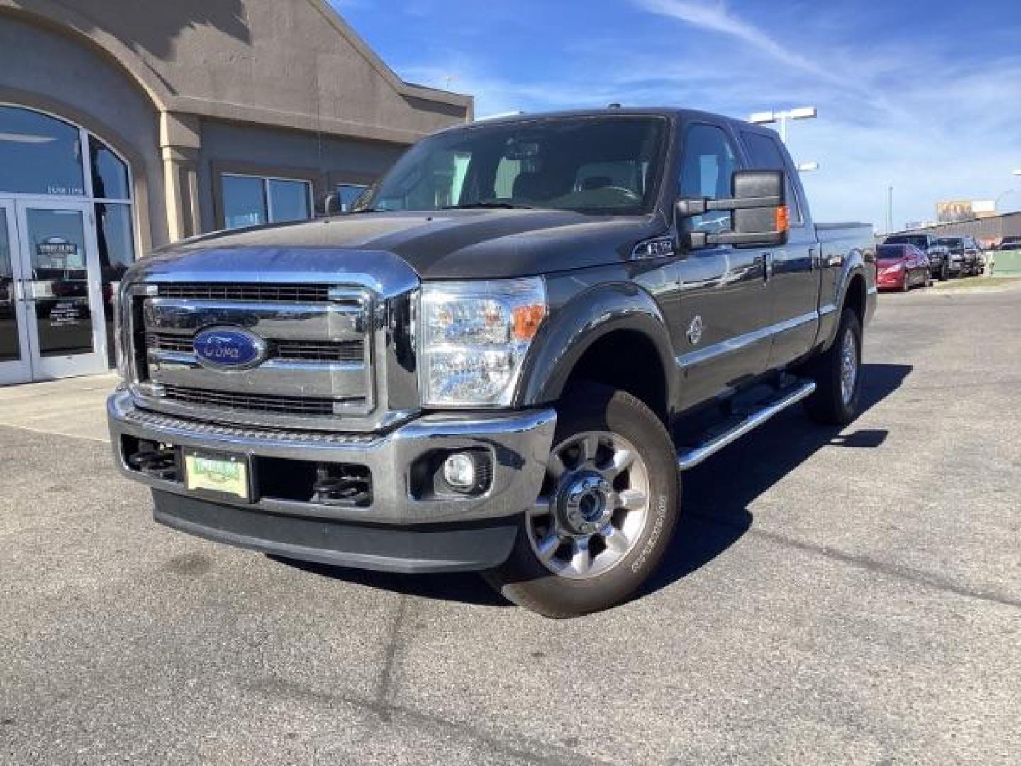 2014 GRAY /Black Ford F-350 SD Lariat Crew Cab 4WD (1FT8W3BT8EE) with an 6.7L V8 OHV 16V DIESEL engine, 6-Speed Automatic transmission, located at 1235 N Woodruff Ave., Idaho Falls, 83401, (208) 523-1053, 43.507172, -112.000488 - Photo#1