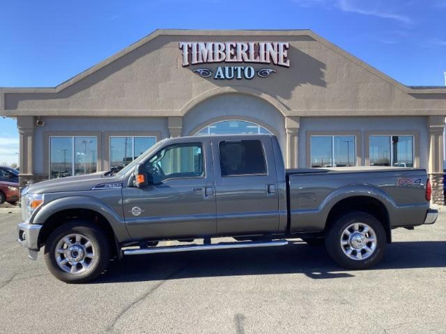 2014 GRAY /Black Ford F-350 SD Lariat Crew Cab 4WD (1FT8W3BT8EE) with an 6.7L V8 OHV 16V DIESEL engine, 6-Speed Automatic transmission, located at 1235 N Woodruff Ave., Idaho Falls, 83401, (208) 523-1053, 43.507172, -112.000488 - Photo#2