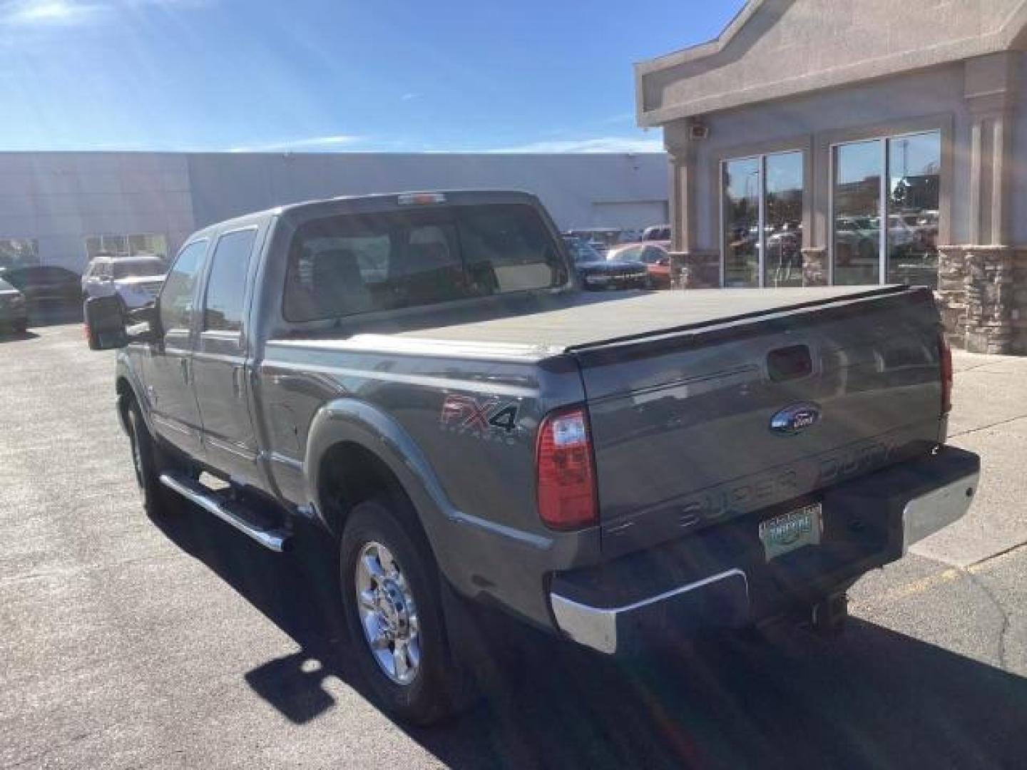 2014 GRAY /Black Ford F-350 SD Lariat Crew Cab 4WD (1FT8W3BT8EE) with an 6.7L V8 OHV 16V DIESEL engine, 6-Speed Automatic transmission, located at 1235 N Woodruff Ave., Idaho Falls, 83401, (208) 523-1053, 43.507172, -112.000488 - Photo#3