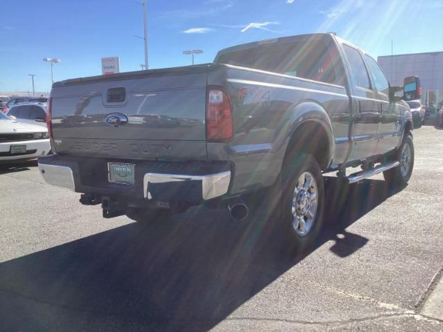 2014 GRAY /Black Ford F-350 SD Lariat Crew Cab 4WD (1FT8W3BT8EE) with an 6.7L V8 OHV 16V DIESEL engine, 6-Speed Automatic transmission, located at 1235 N Woodruff Ave., Idaho Falls, 83401, (208) 523-1053, 43.507172, -112.000488 - Photo#5