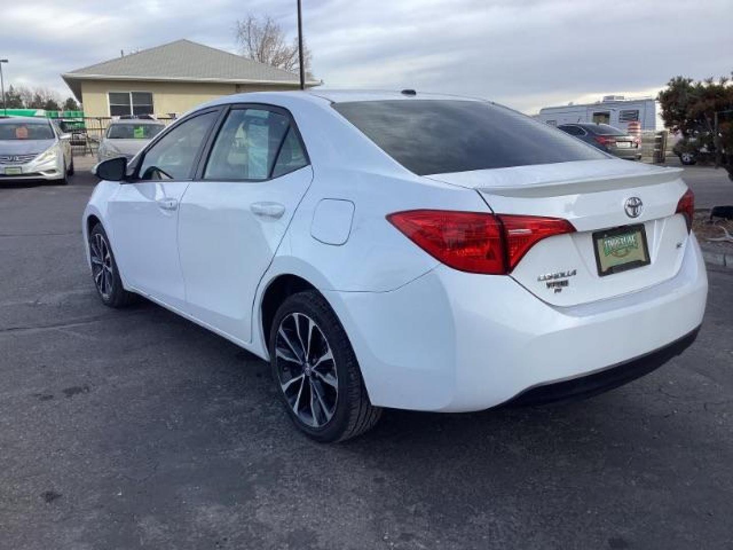 2019 Super White Toyota Corolla SE 6M (2T1BURHE4KC) with an 1.8L L4 DOHC 16V engine, 6-Speed Manual transmission, located at 1235 N Woodruff Ave., Idaho Falls, 83401, (208) 523-1053, 43.507172, -112.000488 - Photo#3