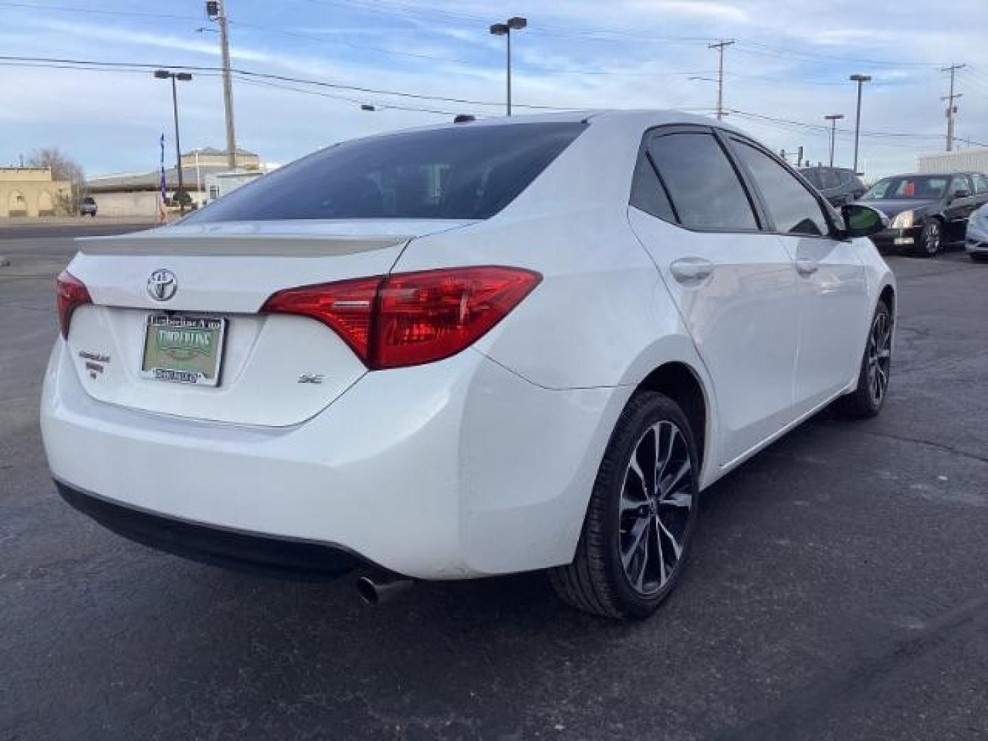 2019 Super White Toyota Corolla SE 6M (2T1BURHE4KC) with an 1.8L L4 DOHC 16V engine, 6-Speed Manual transmission, located at 1235 N Woodruff Ave., Idaho Falls, 83401, (208) 523-1053, 43.507172, -112.000488 - Photo#5