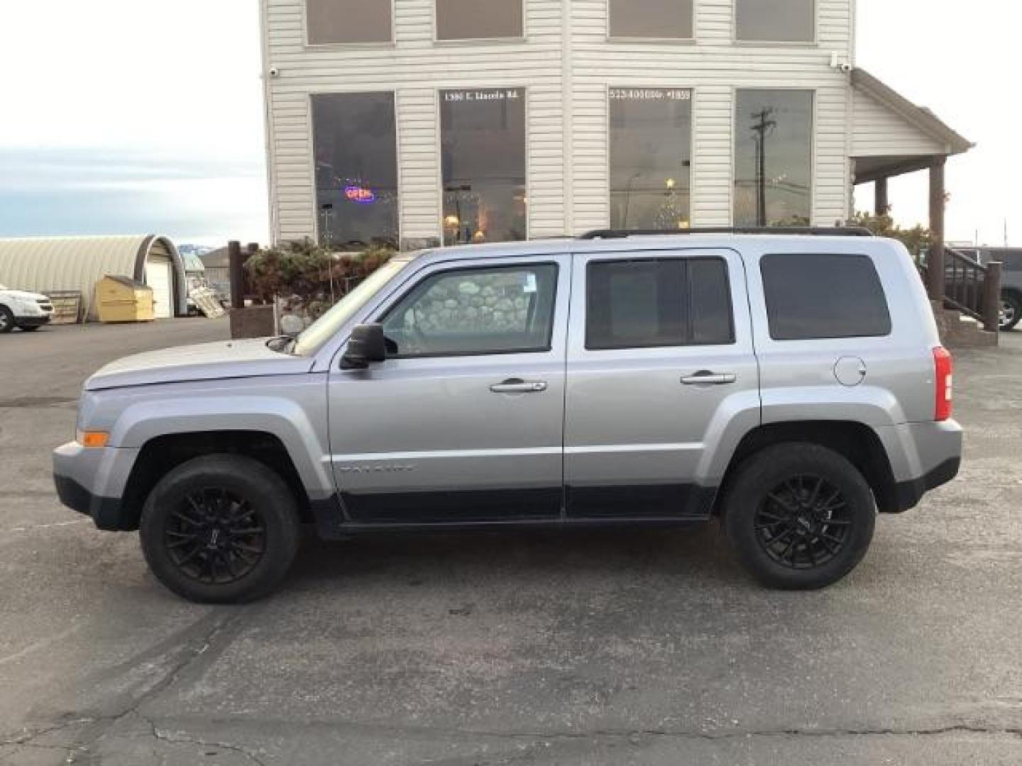 2015 Billet Silver Metallic CC Jeep Patriot Sport 4WD (1C4NJRAB6FD) with an 2.4L L4 DOHC 16V engine, located at 1235 N Woodruff Ave., Idaho Falls, 83401, (208) 523-1053, 43.507172, -112.000488 - Photo#2