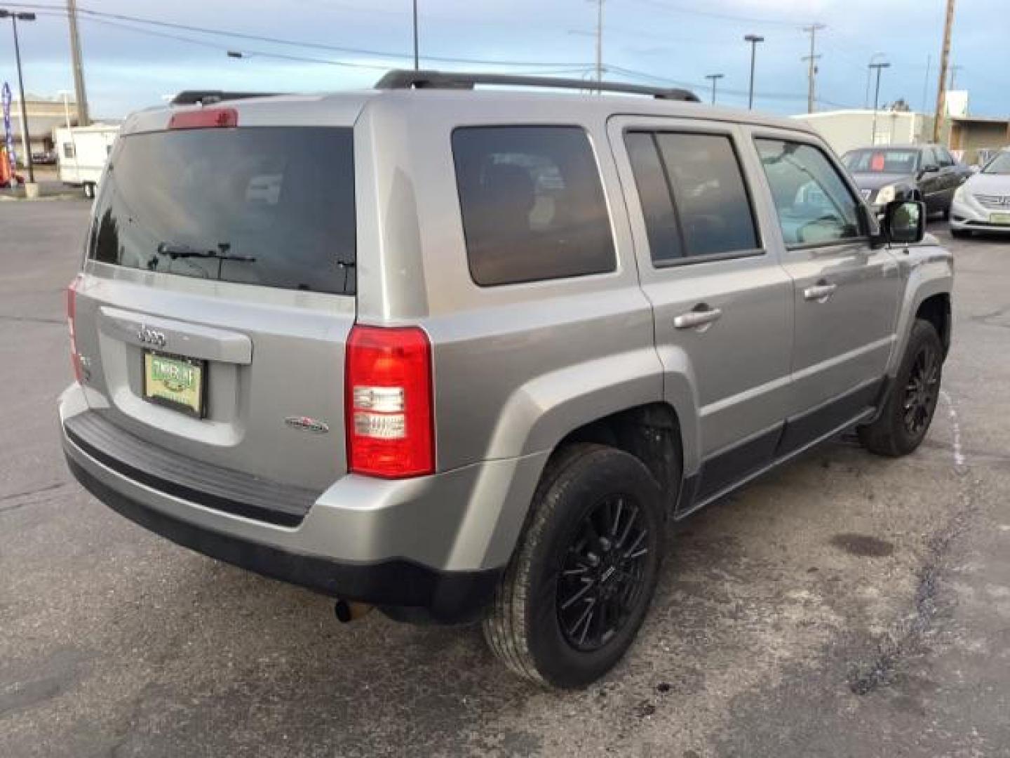 2015 Billet Silver Metallic CC Jeep Patriot Sport 4WD (1C4NJRAB6FD) with an 2.4L L4 DOHC 16V engine, located at 1235 N Woodruff Ave., Idaho Falls, 83401, (208) 523-1053, 43.507172, -112.000488 - Photo#5