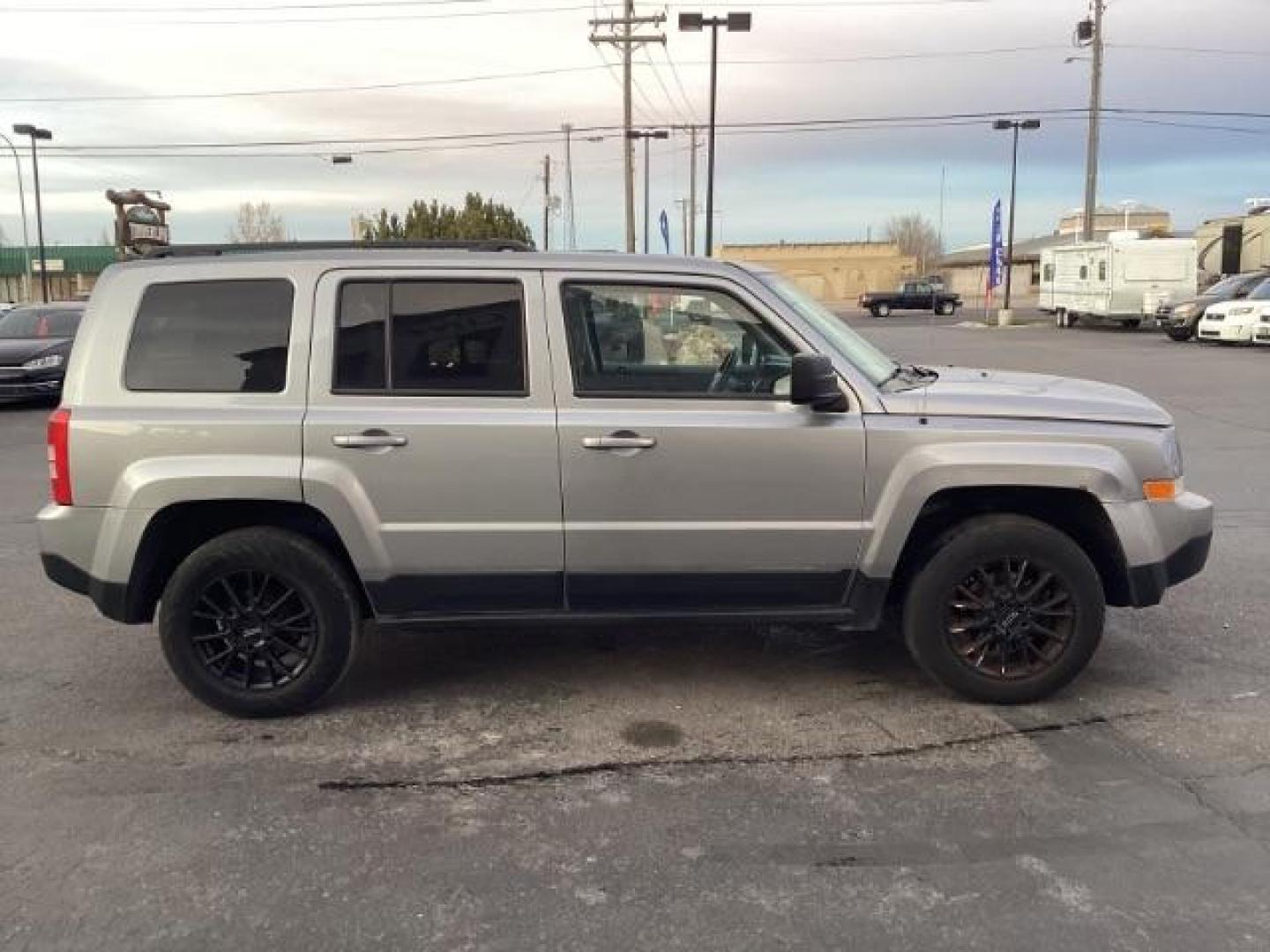 2015 Billet Silver Metallic CC Jeep Patriot Sport 4WD (1C4NJRAB6FD) with an 2.4L L4 DOHC 16V engine, located at 1235 N Woodruff Ave., Idaho Falls, 83401, (208) 523-1053, 43.507172, -112.000488 - Photo#6