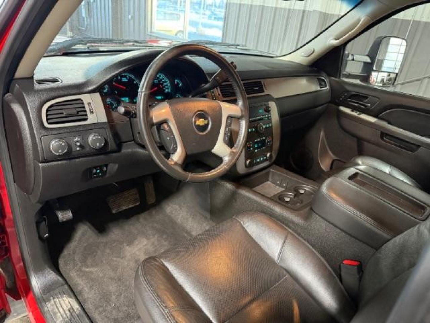 2013 Victory Red /Ebony Leather Interior Chevrolet Silverado 3500HD LTZ Crew Cab 4WD (1GC4K1E80DF) with an 6.6L V8 OHV 32V TURBO DIESEL engine, 6-Speed Automatic transmission, located at 1235 N Woodruff Ave., Idaho Falls, 83401, (208) 523-1053, 43.507172, -112.000488 - Photo#12