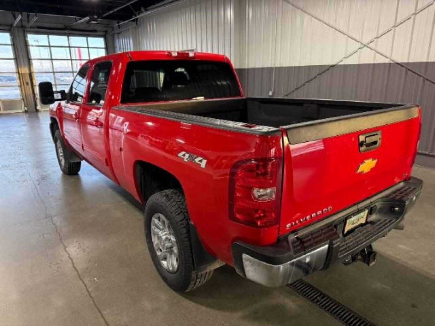 2013 Victory Red /Ebony Leather Interior Chevrolet Silverado 3500HD LTZ Crew Cab 4WD (1GC4K1E80DF) with an 6.6L V8 OHV 32V TURBO DIESEL engine, 6-Speed Automatic transmission, located at 1235 N Woodruff Ave., Idaho Falls, 83401, (208) 523-1053, 43.507172, -112.000488 - Photo#2