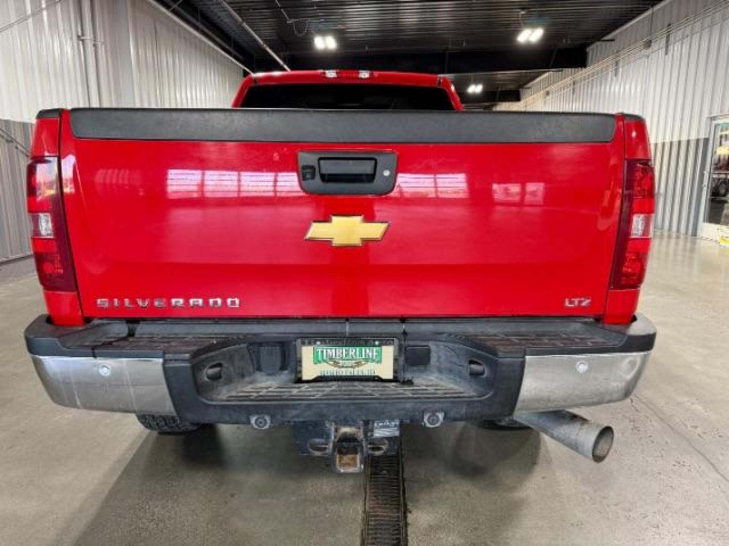 2013 Victory Red /Ebony Leather Interior Chevrolet Silverado 3500HD LTZ Crew Cab 4WD (1GC4K1E80DF) with an 6.6L V8 OHV 32V TURBO DIESEL engine, 6-Speed Automatic transmission, located at 1235 N Woodruff Ave., Idaho Falls, 83401, (208) 523-1053, 43.507172, -112.000488 - Photo#3